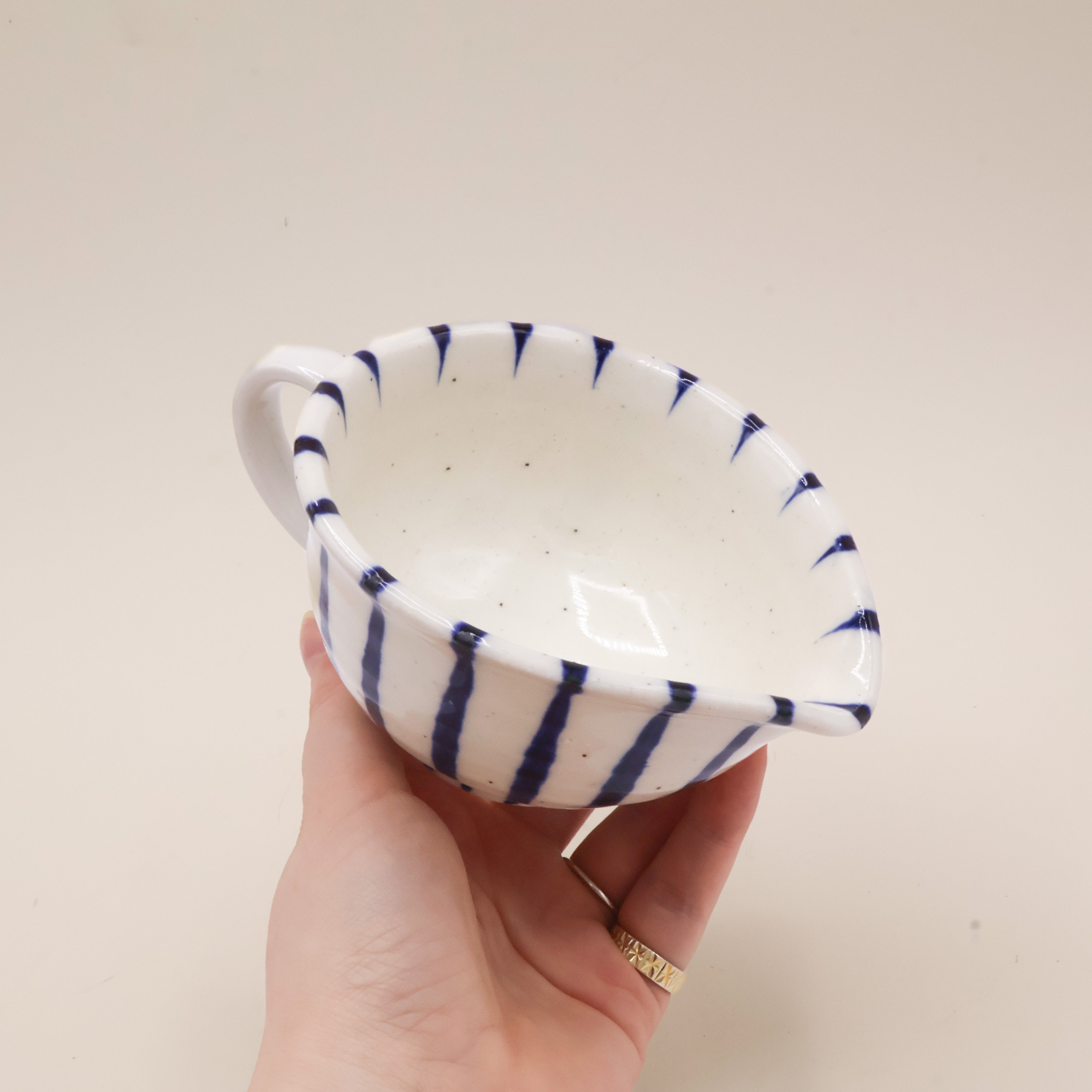 White milk jug with stripes