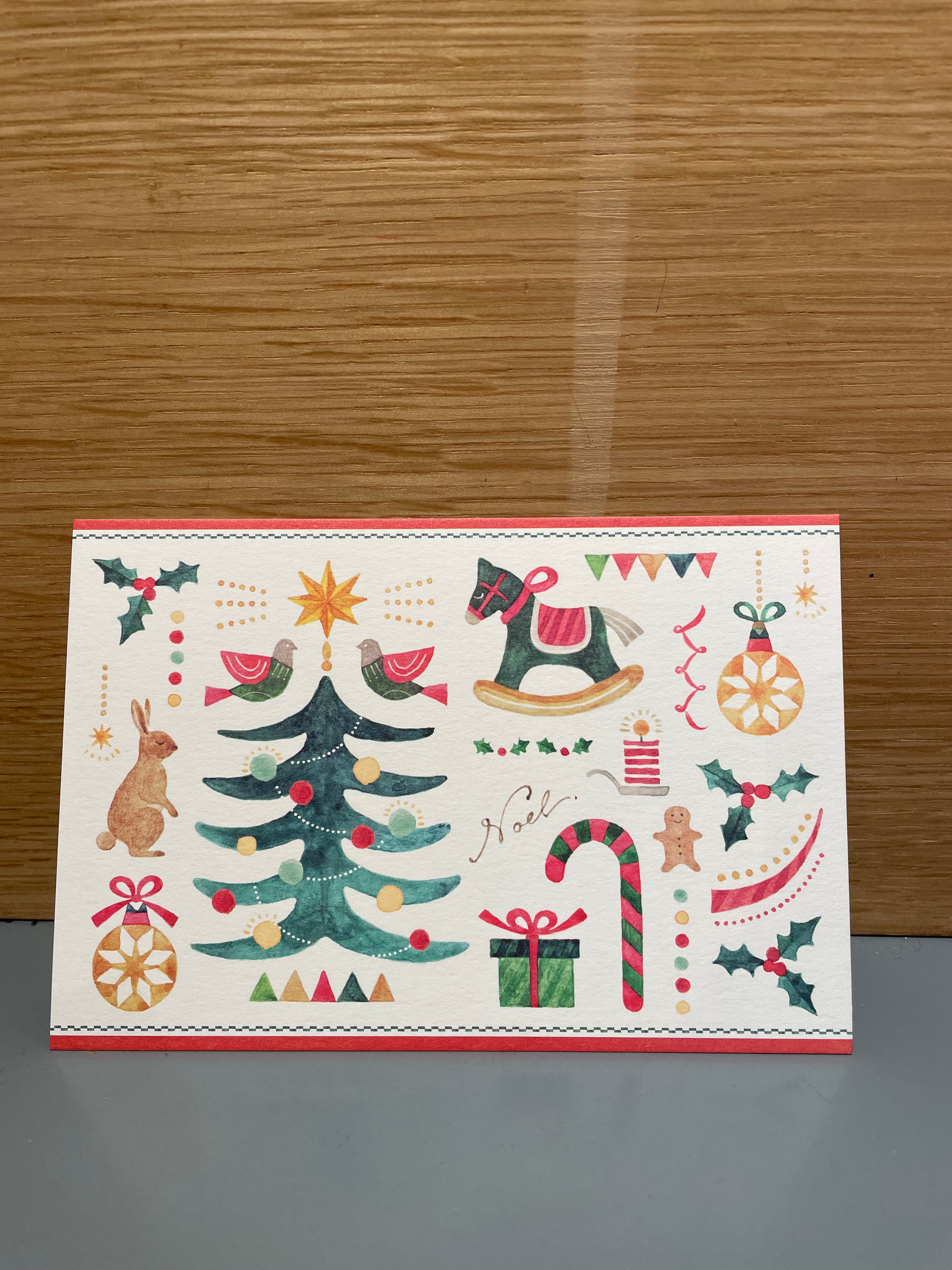 Christmas card with Christmas tree and gifts
