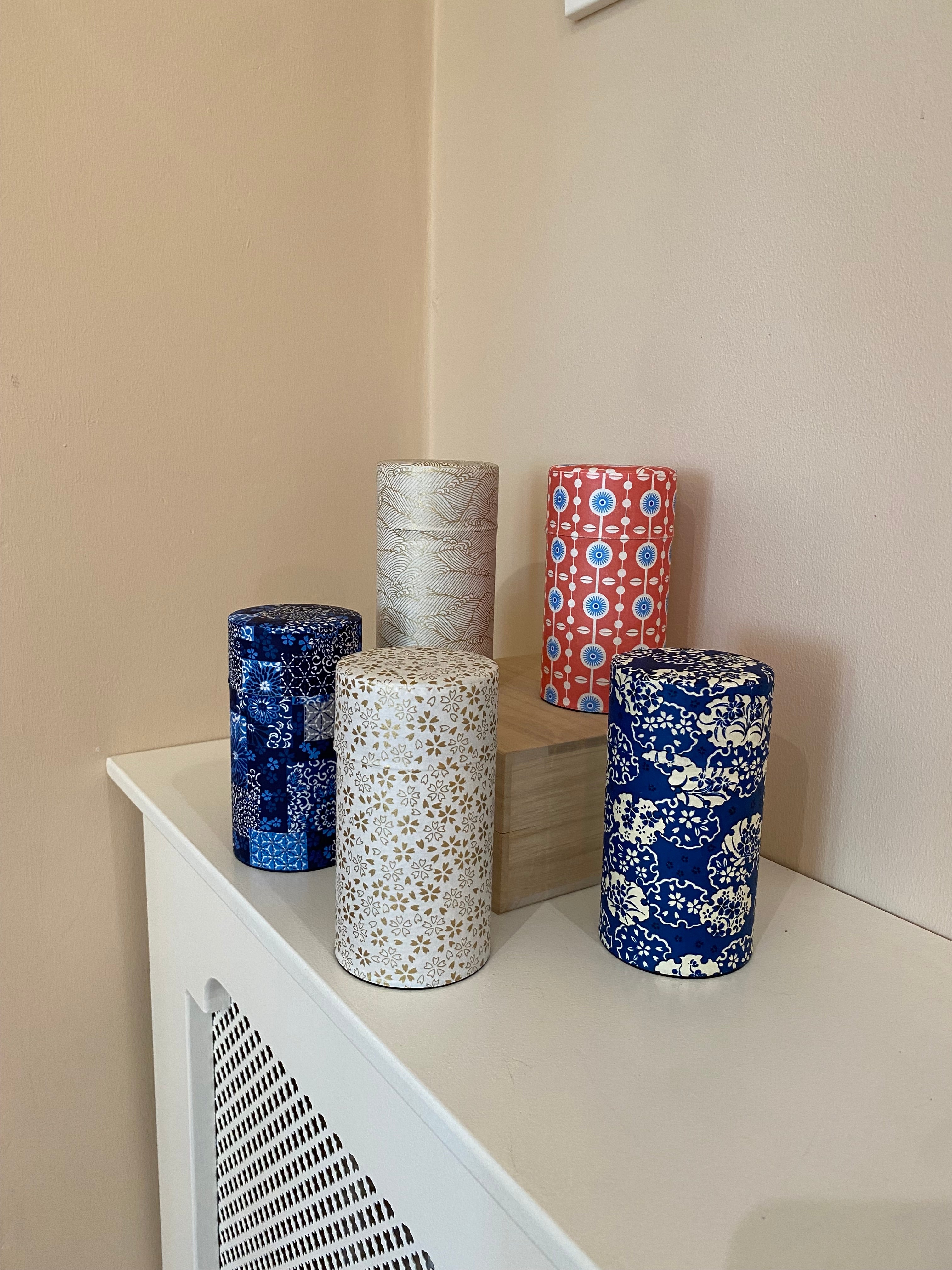 Tea tins in different patterns - tall