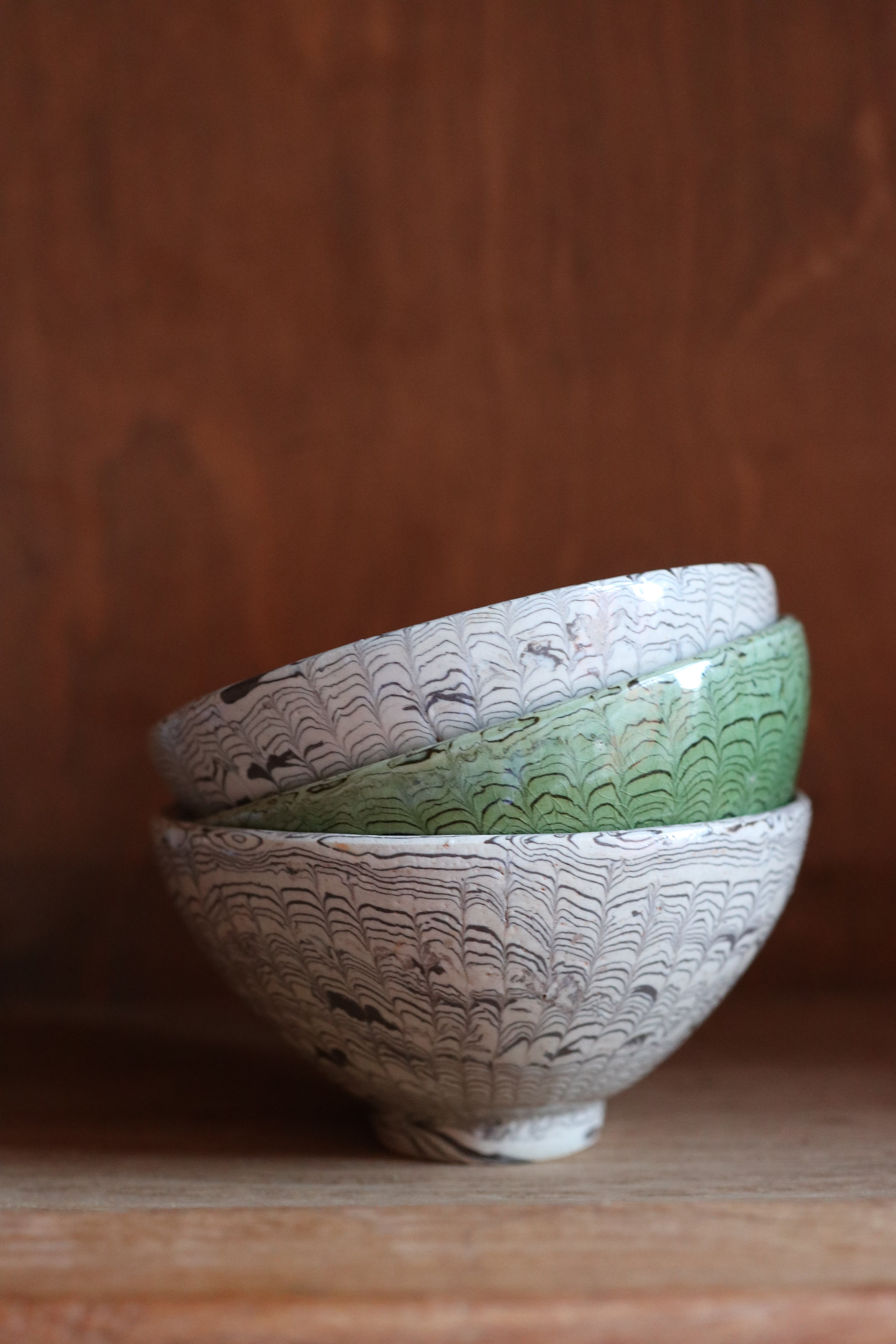 Handmade bowl in brown and beige clay