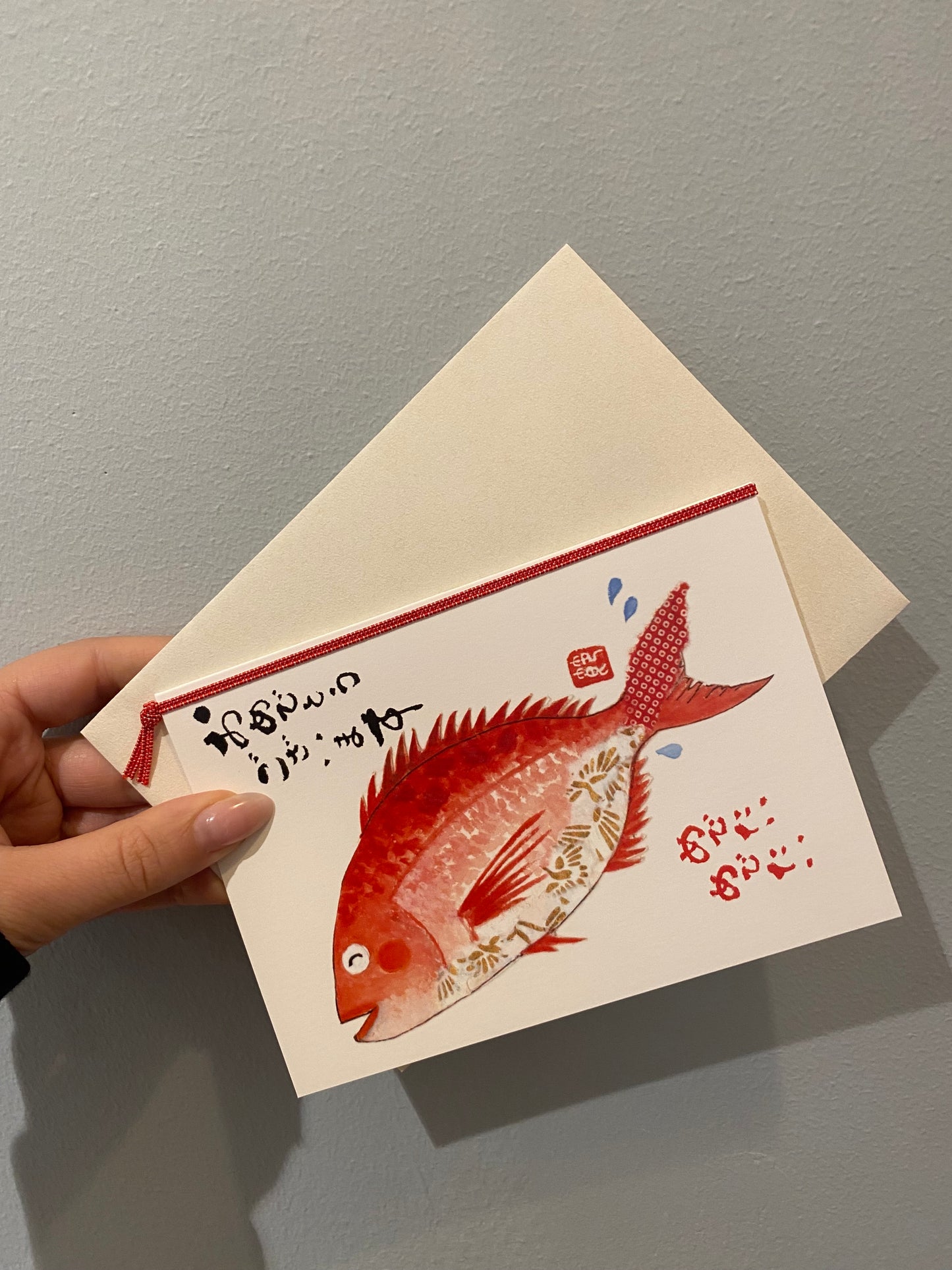 Kort med rød fisk inkl. kuvert