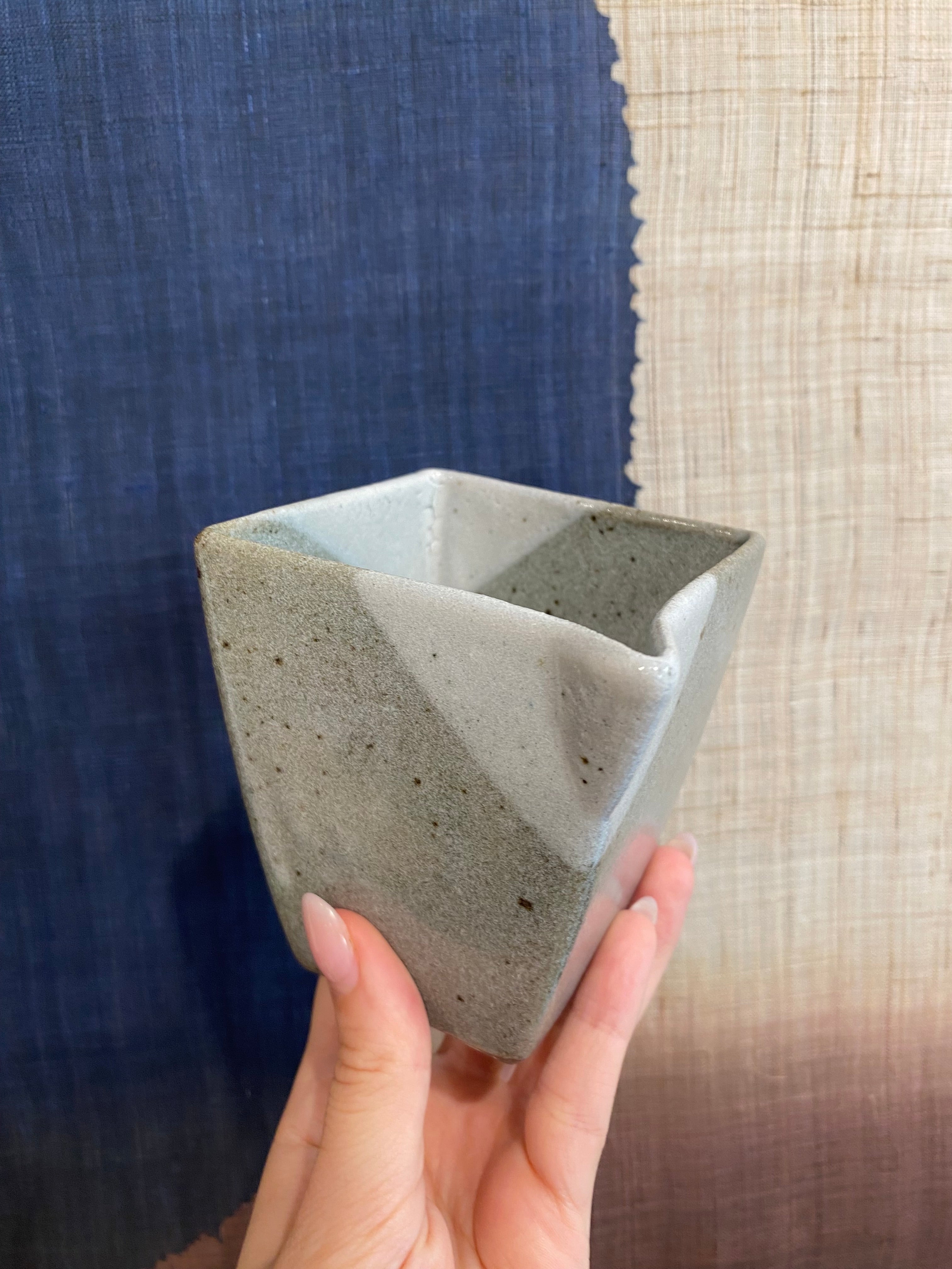Square sake pitcher with gray glaze and crackers