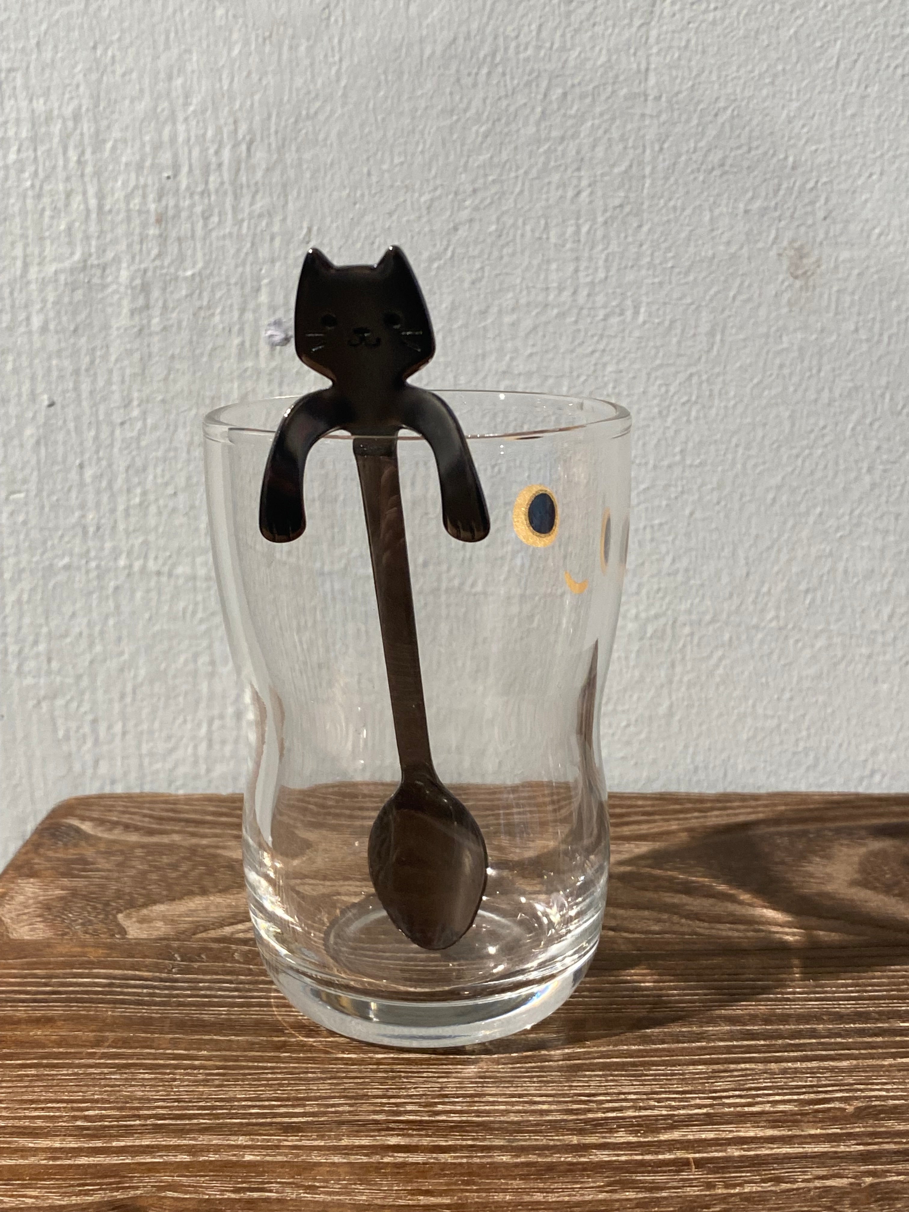 Steel spoon with cat