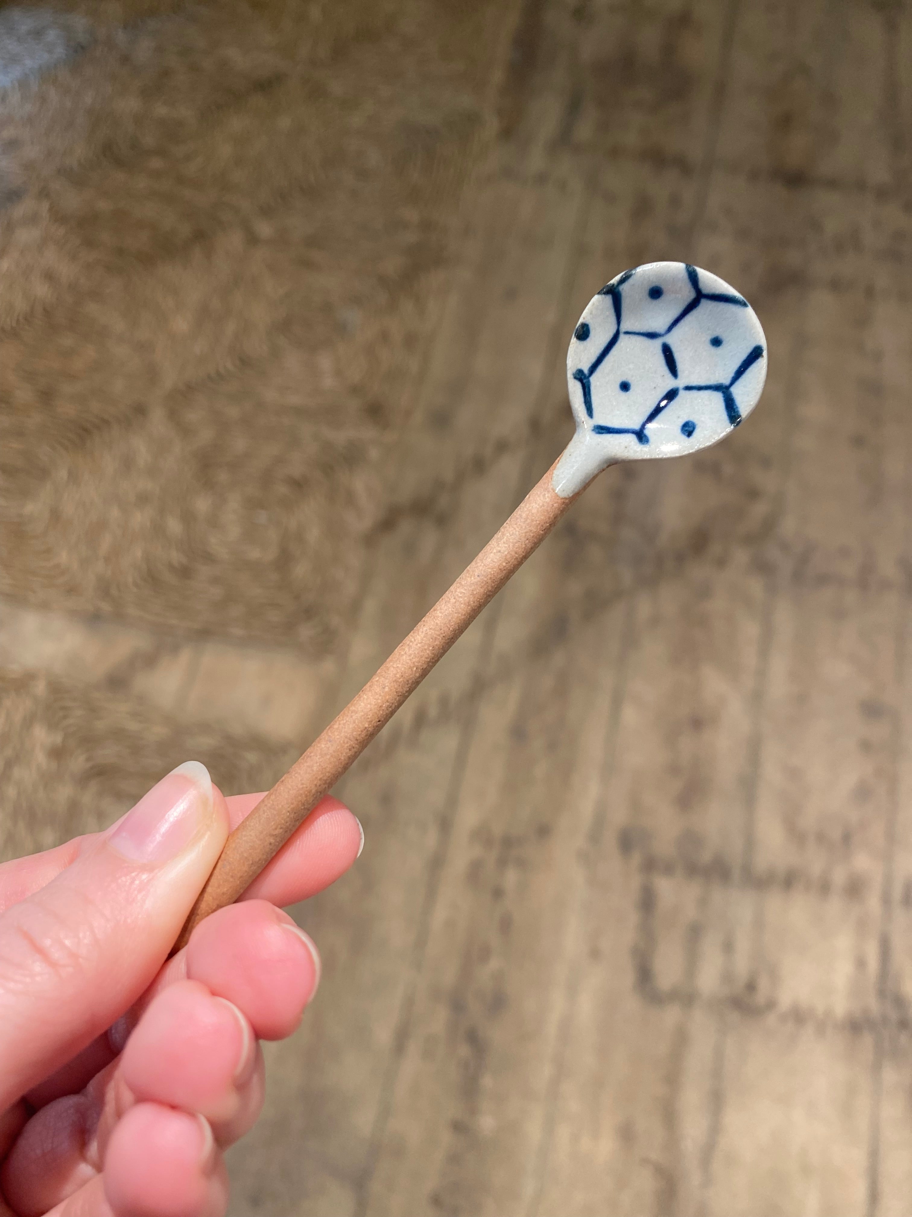 Ceramic spoon with blue motif