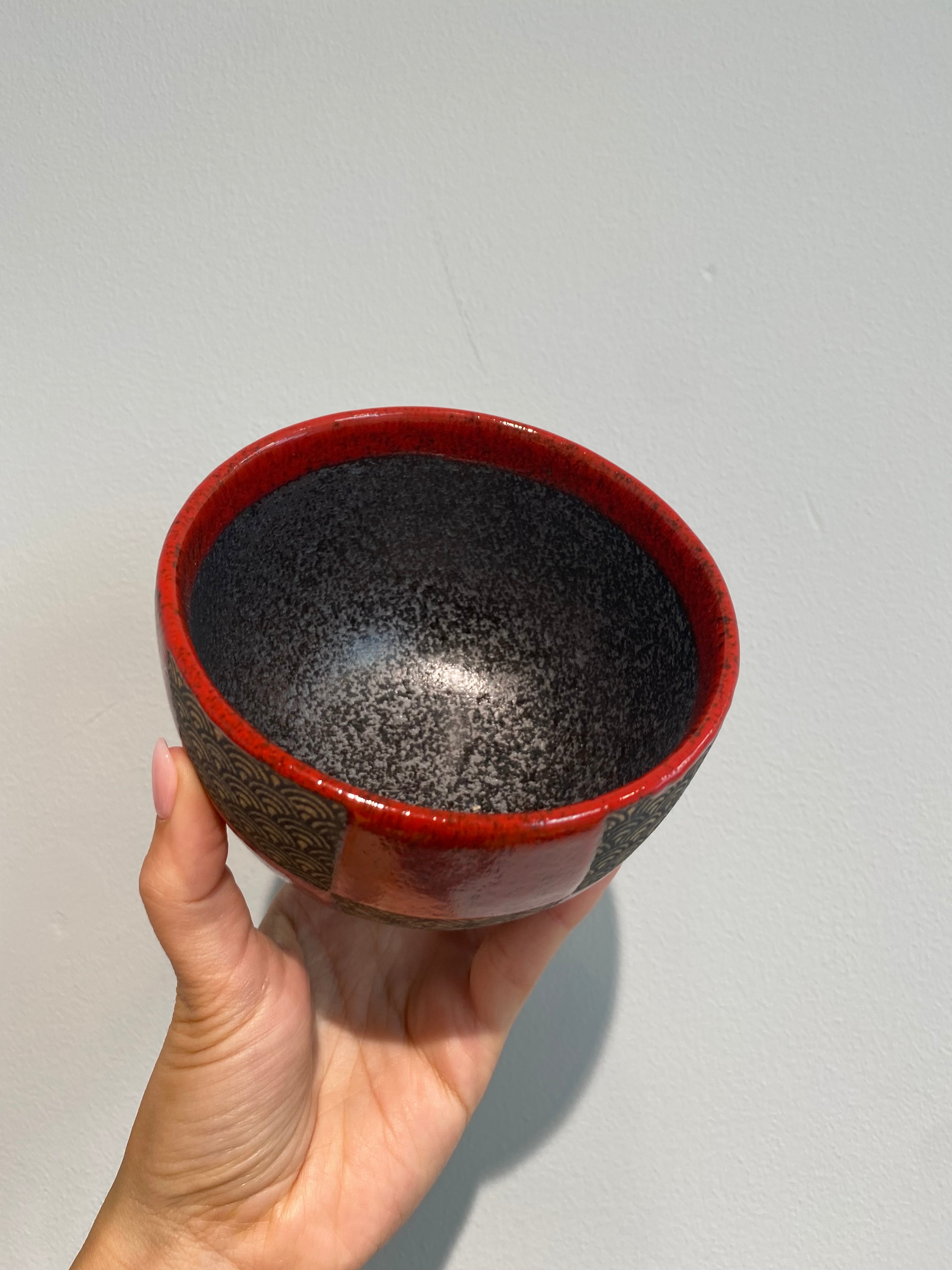 Ceramic bowl with red checks and Japanese patterns
