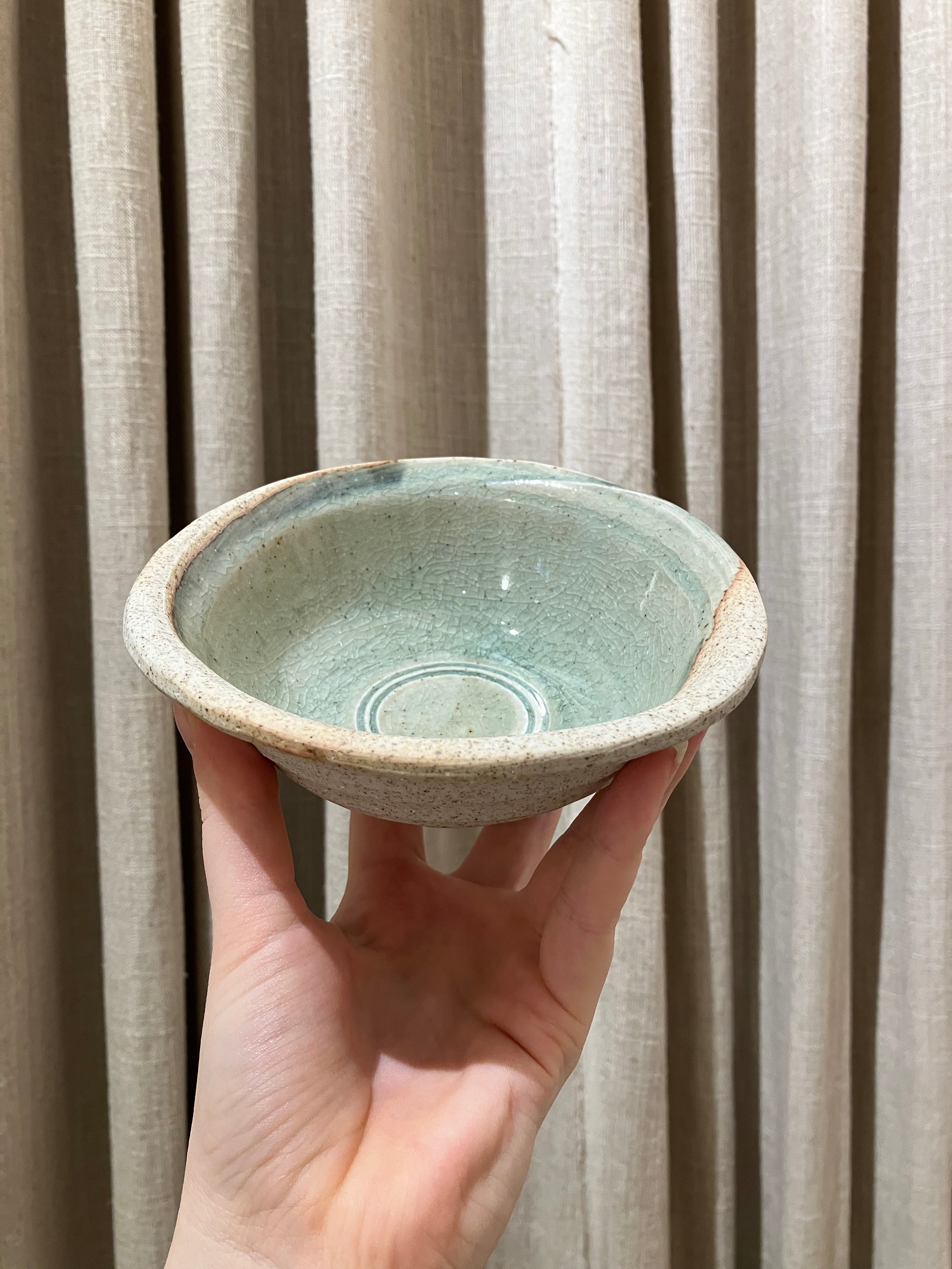 Stoneware bowl with green glaze
