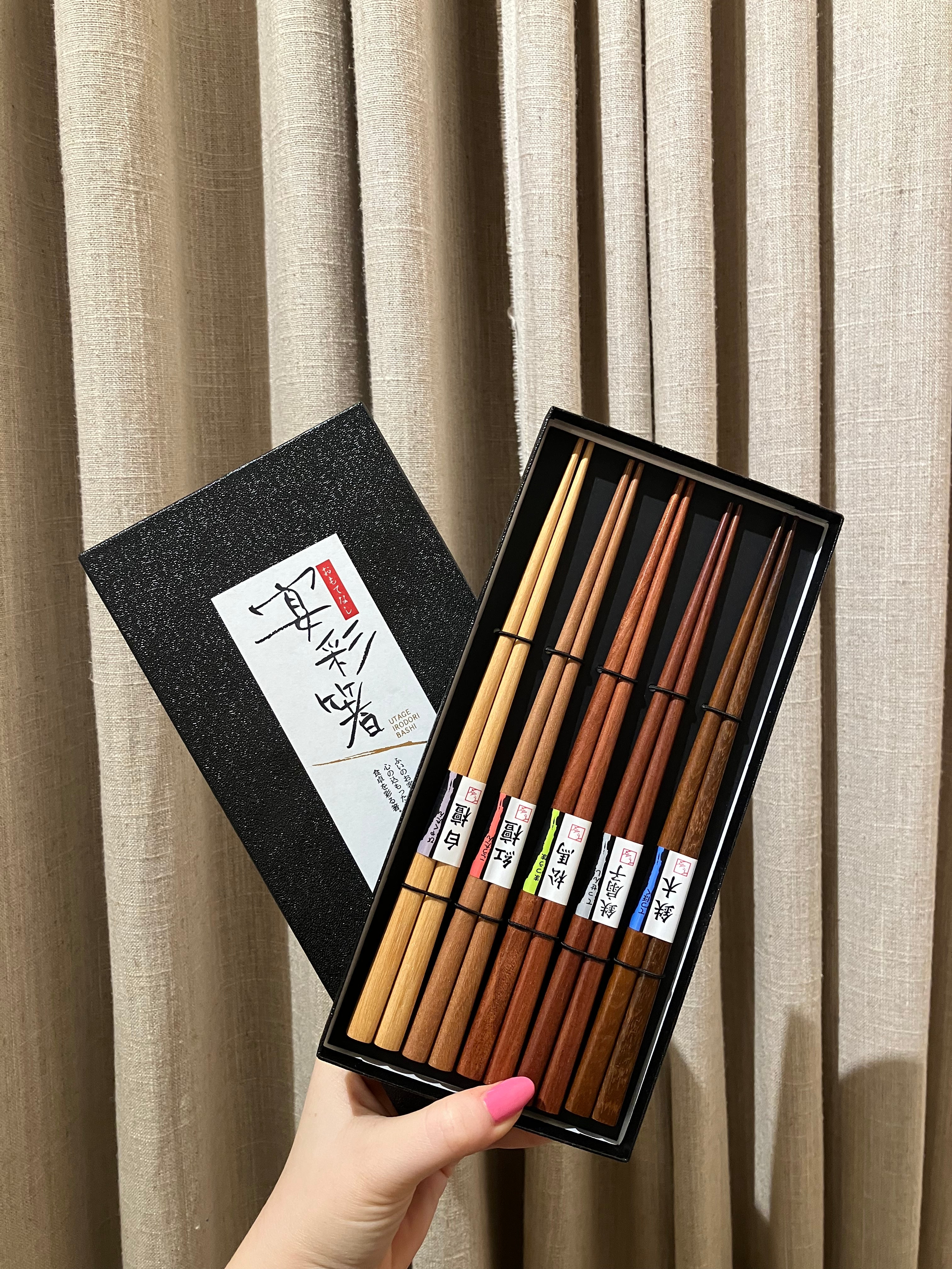 Chopsticks in different shades of wood