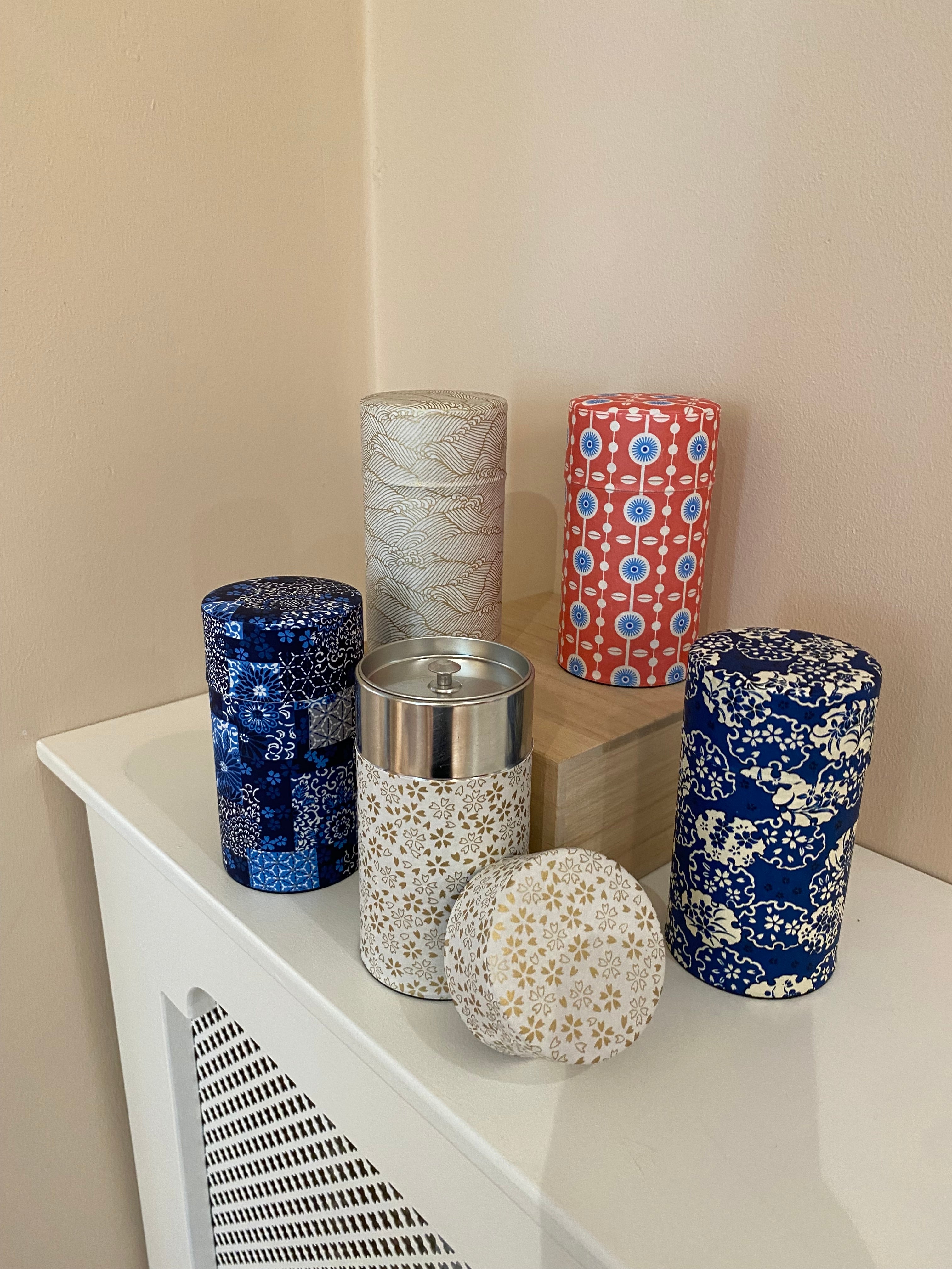 Tea tins in different patterns - tall
