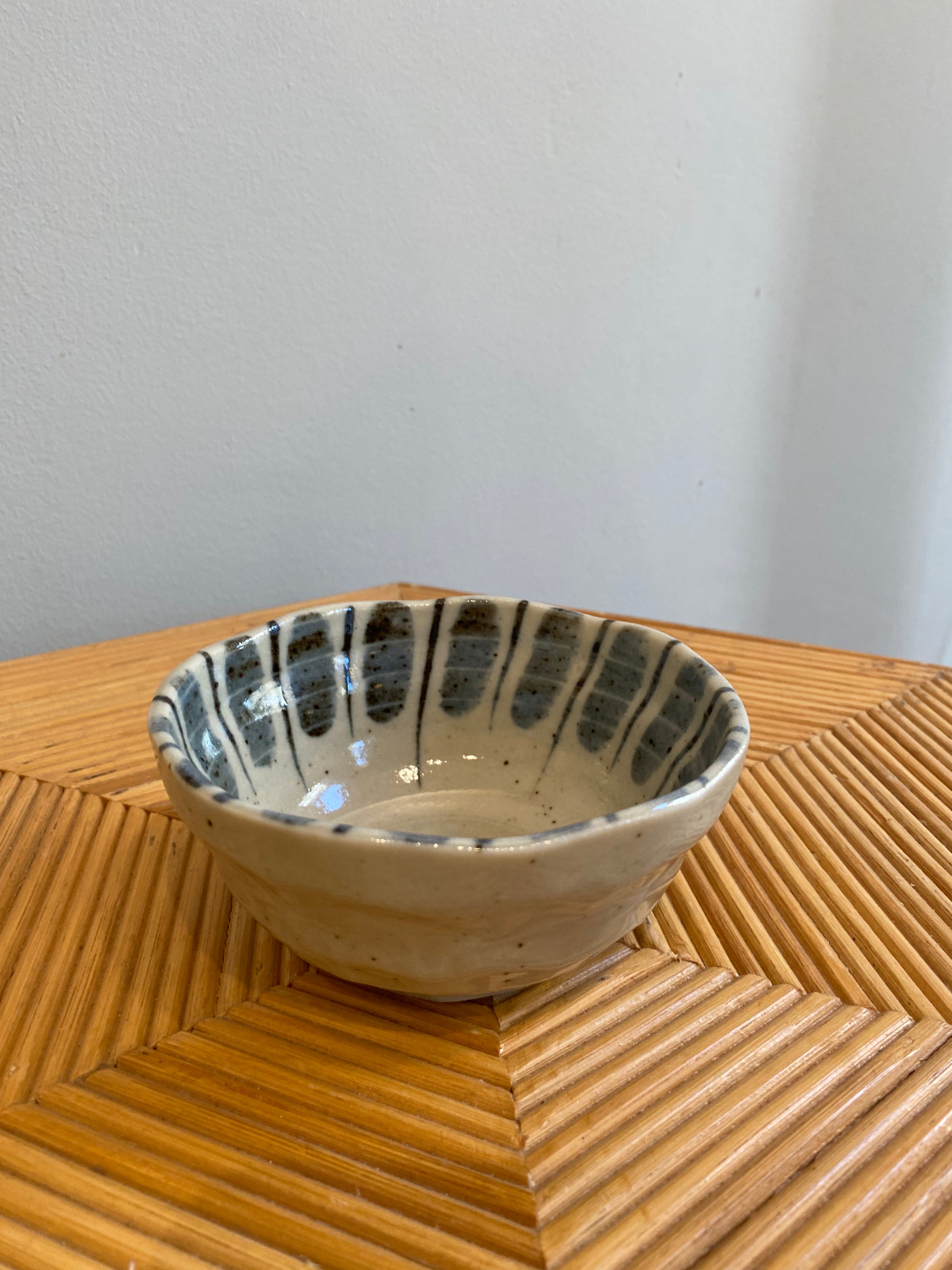 Bowl with blue and brown stripes and small dots