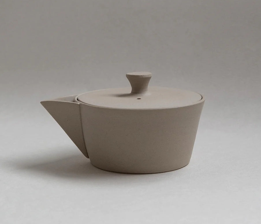 Tea set with low teapot and two cups/bowls
