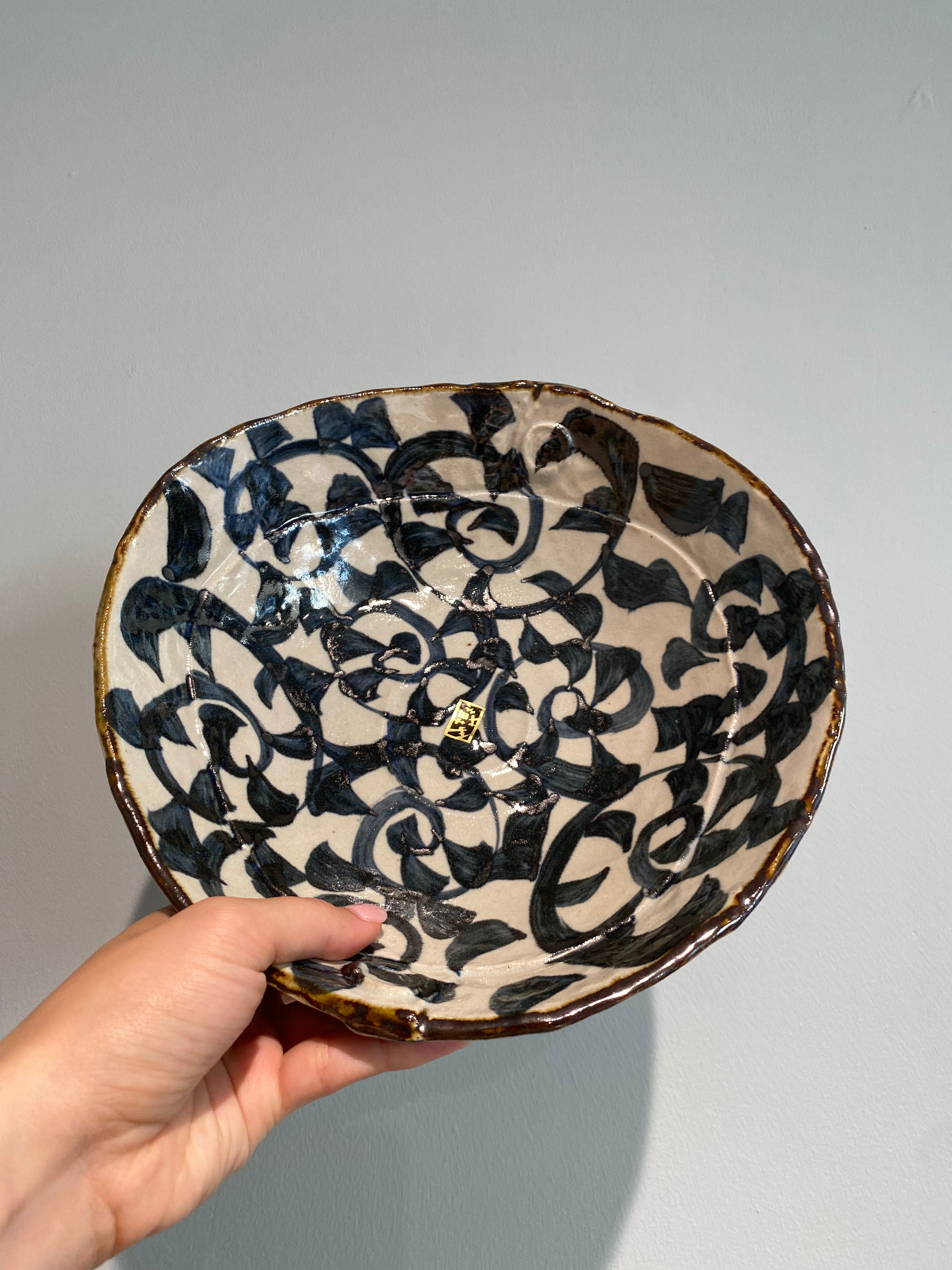Large bowl with white glaze and dark blue pattern and brown rim - 40%