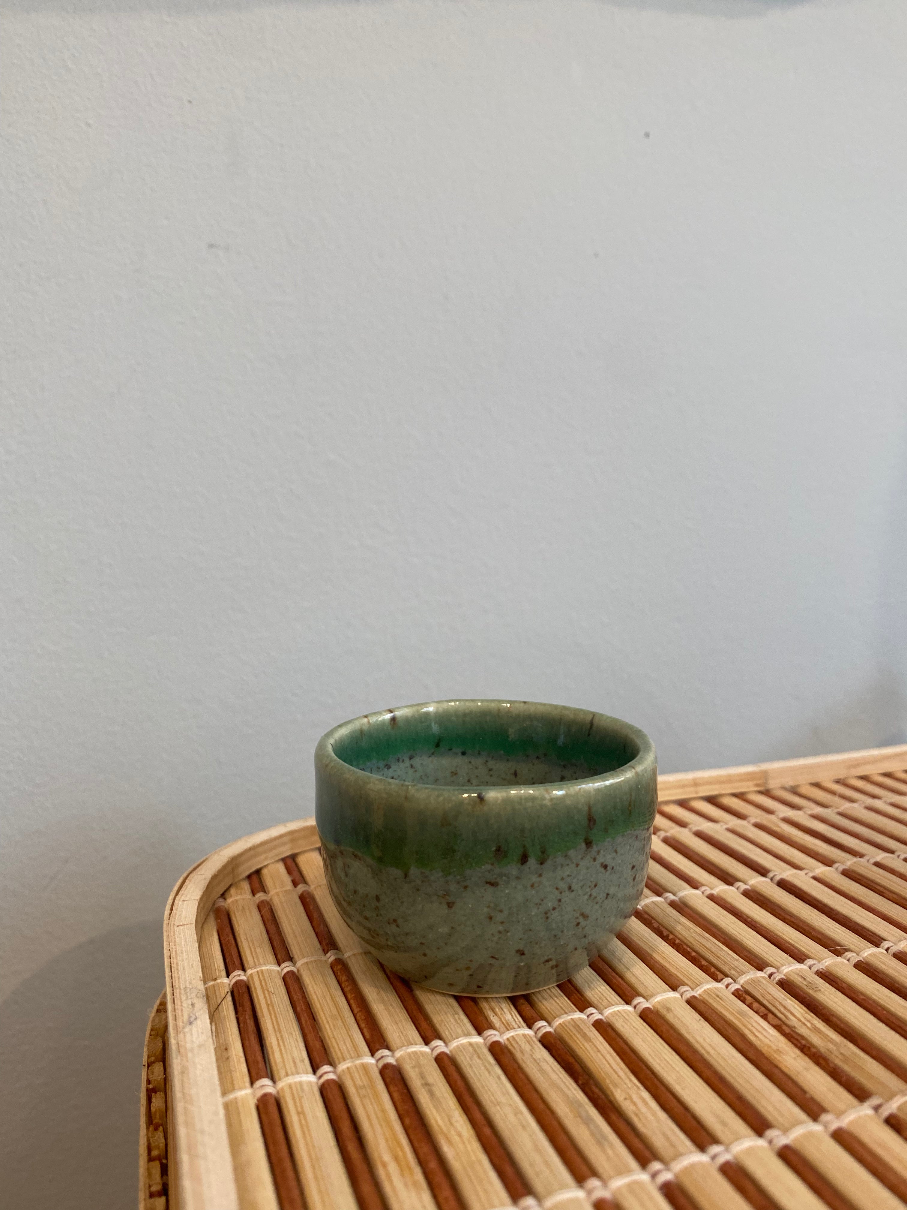 Sake cup with green shades of glaze