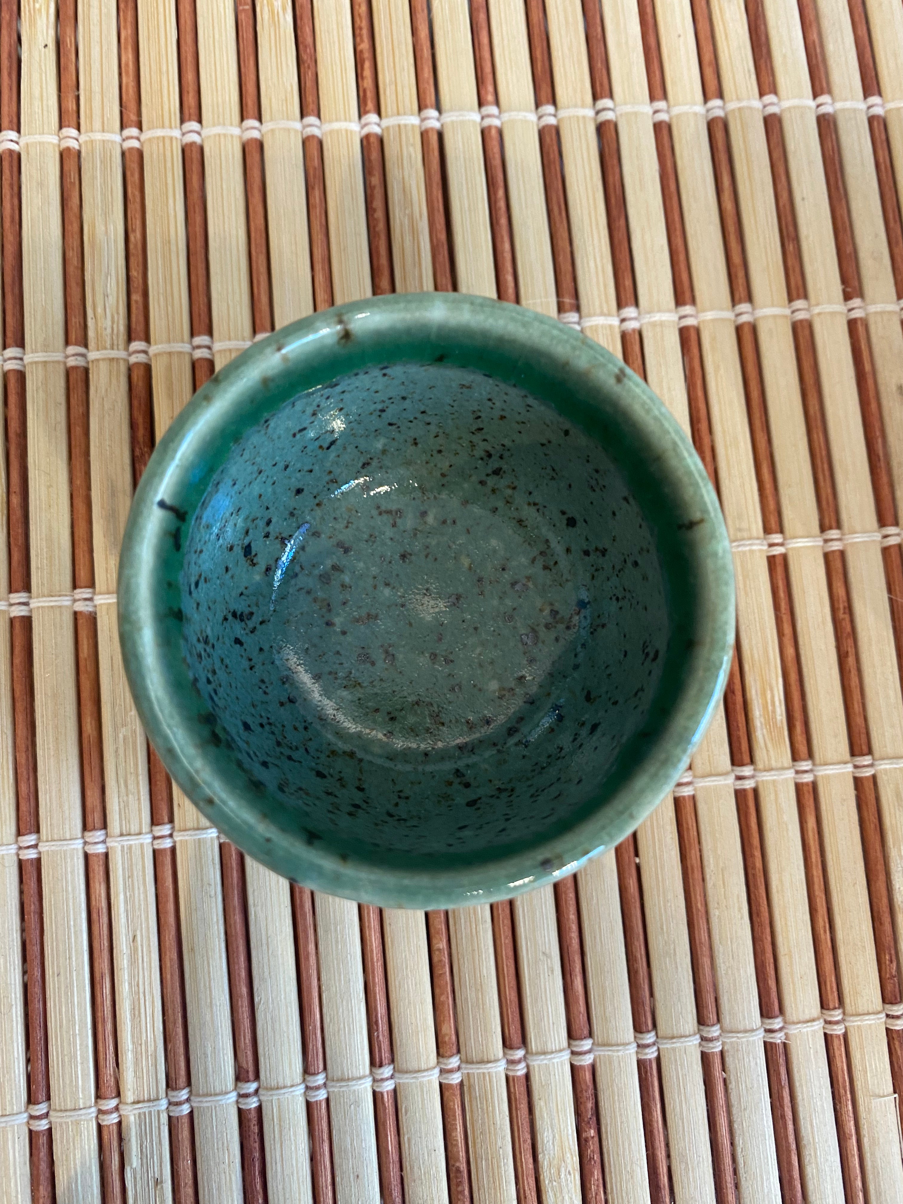 Sake cup with green shades of glaze