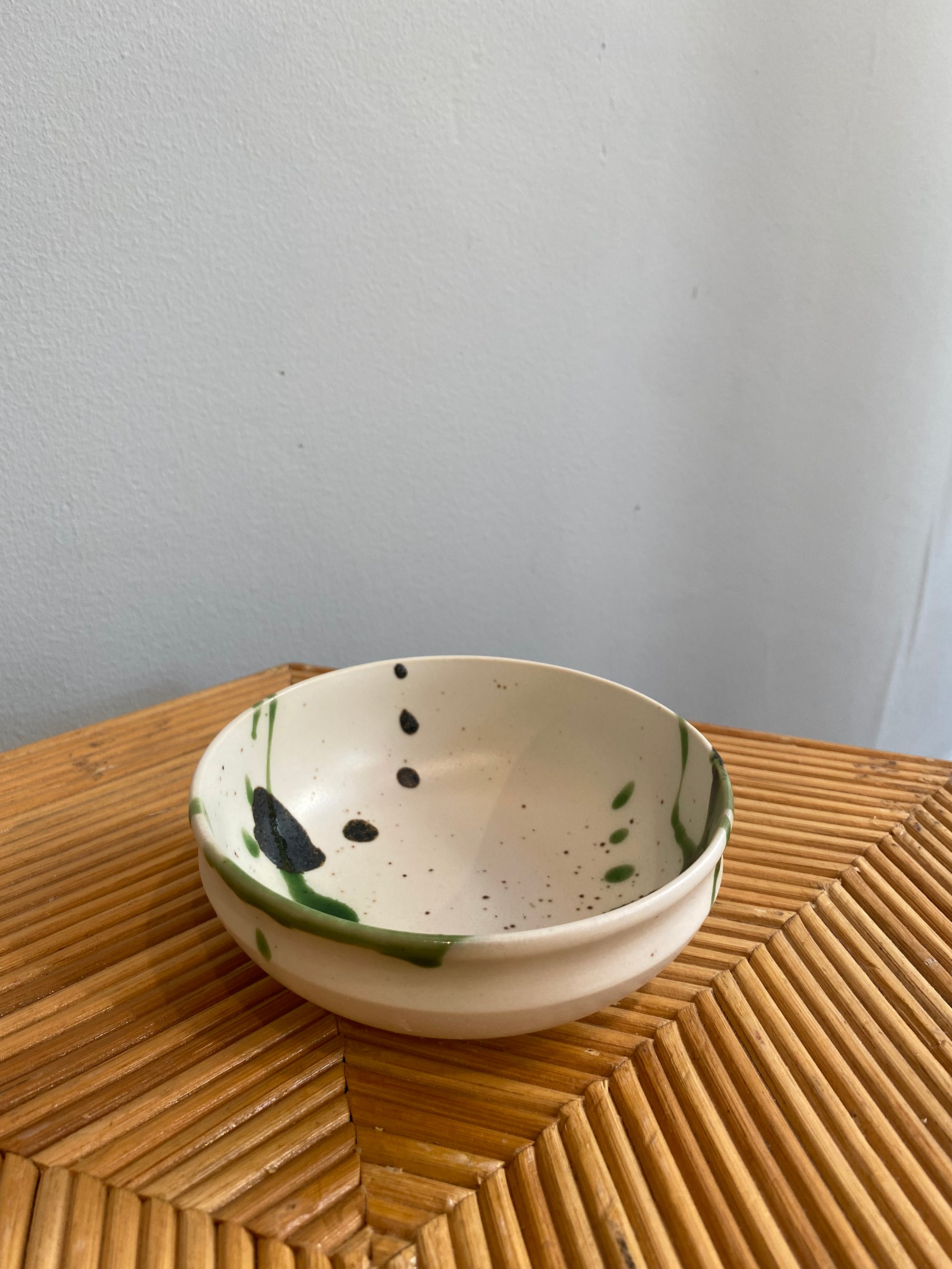 Make bowl with white glaze and green splash