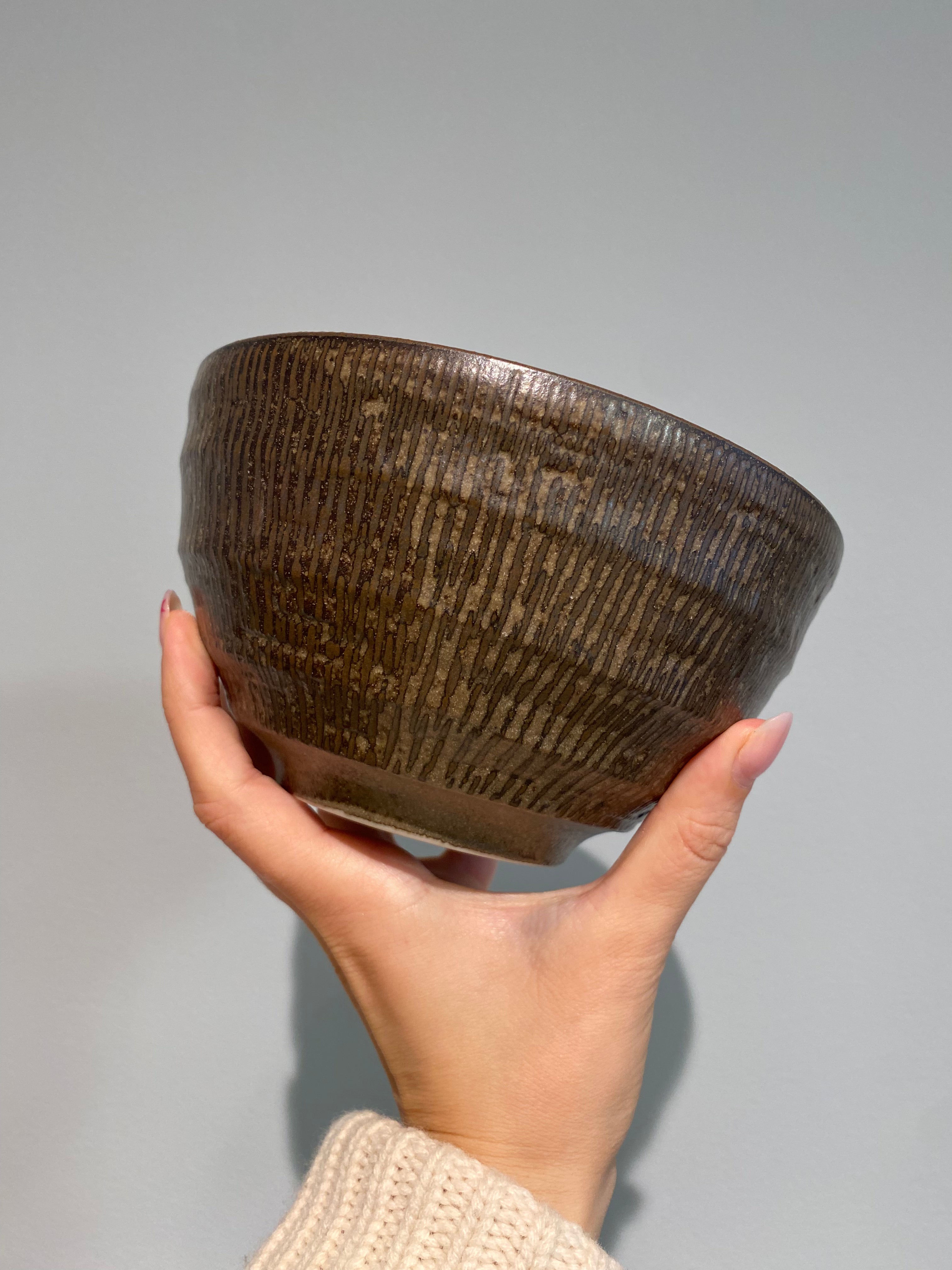 Tall rustic bowl with brown glaze