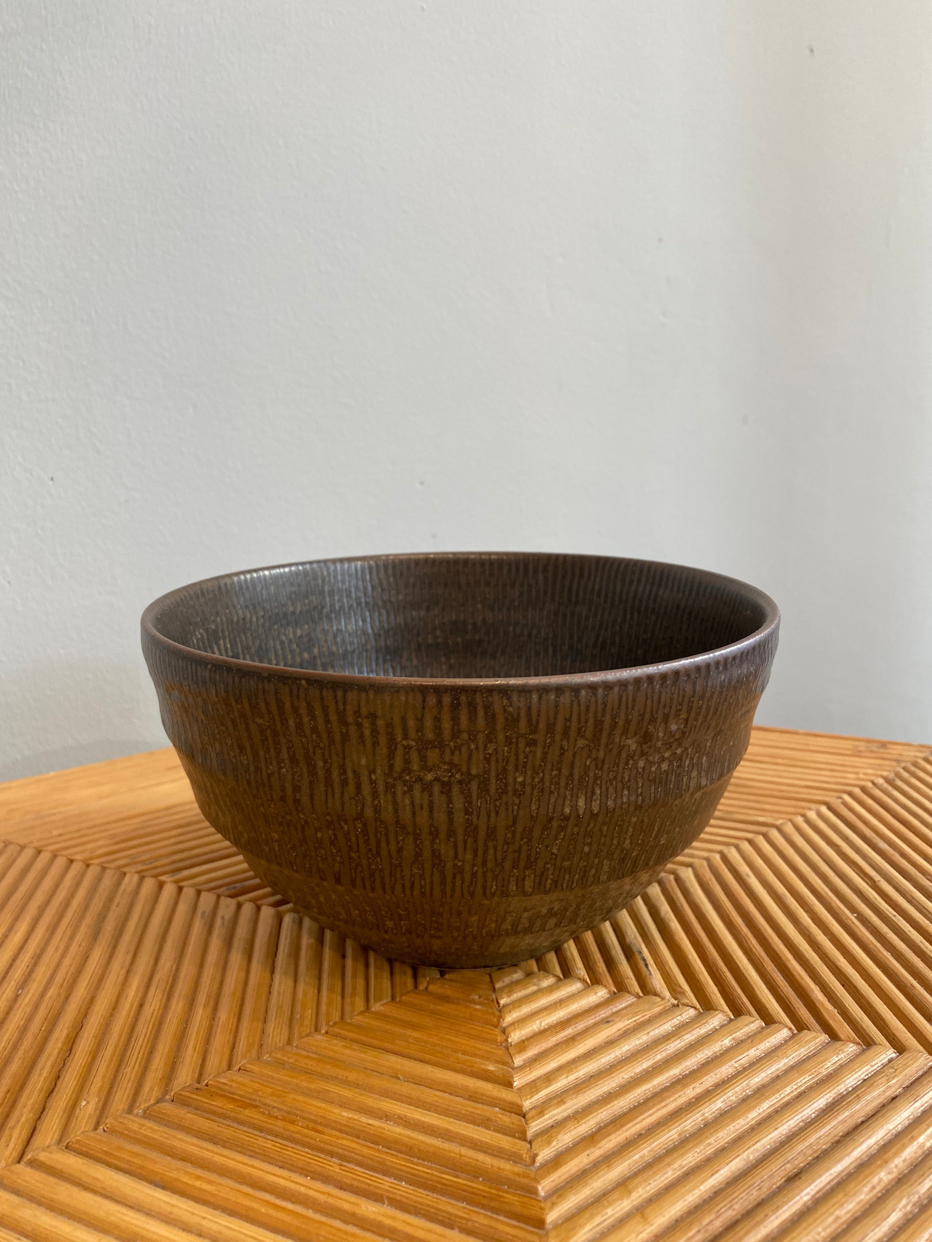 Tall rustic bowl with brown glaze