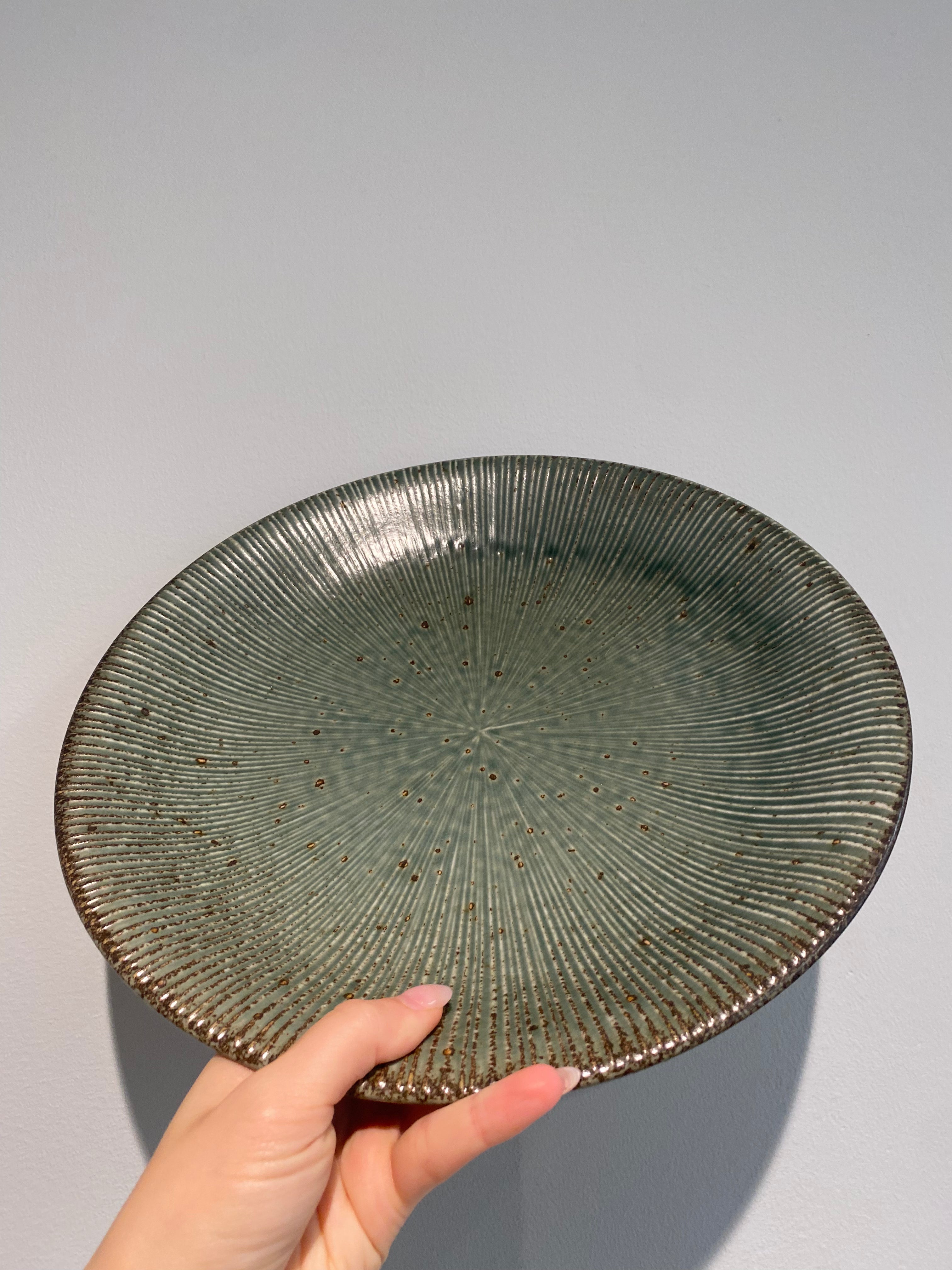 Japanese rustic dish with green glaze