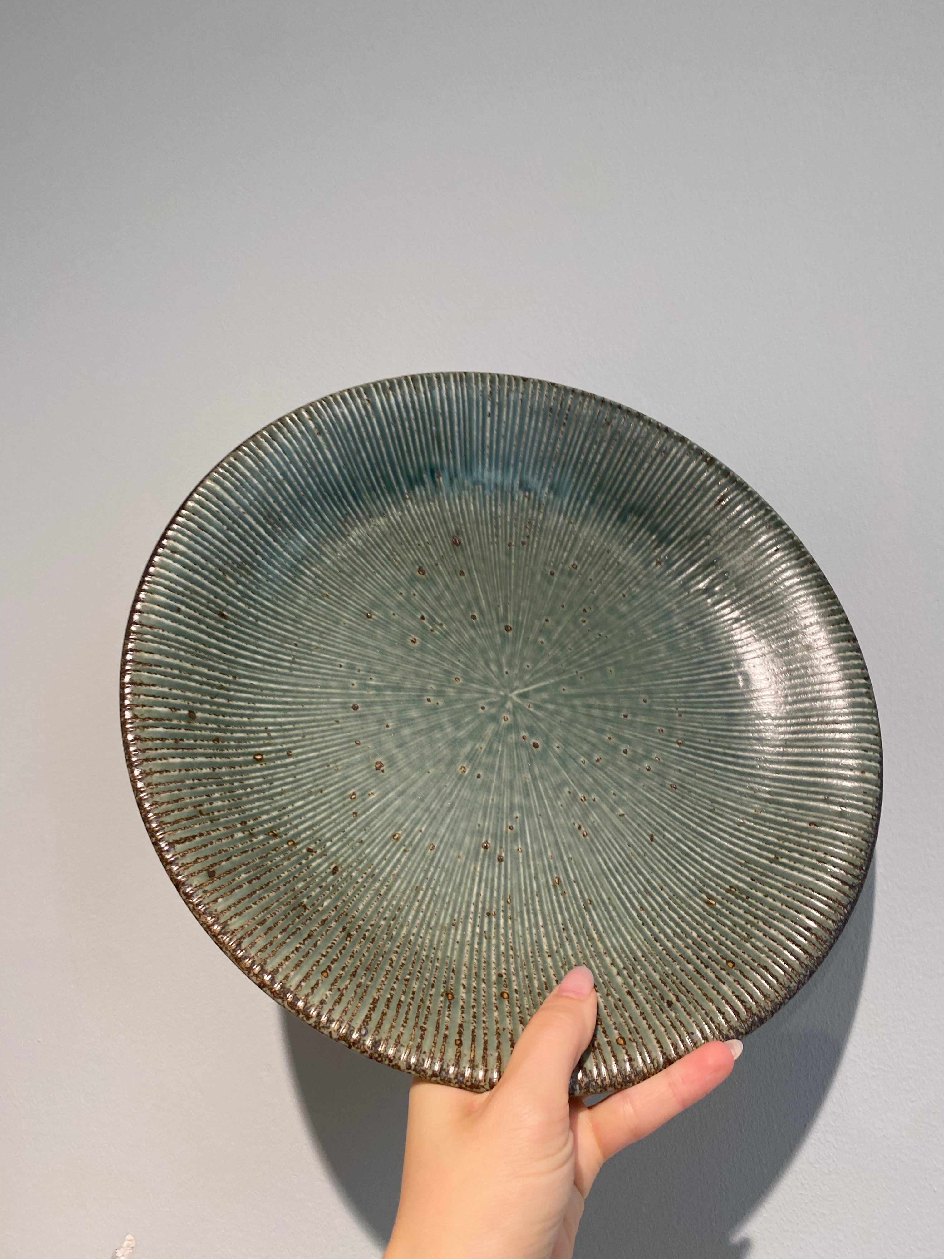 Japanese rustic dish with green glaze