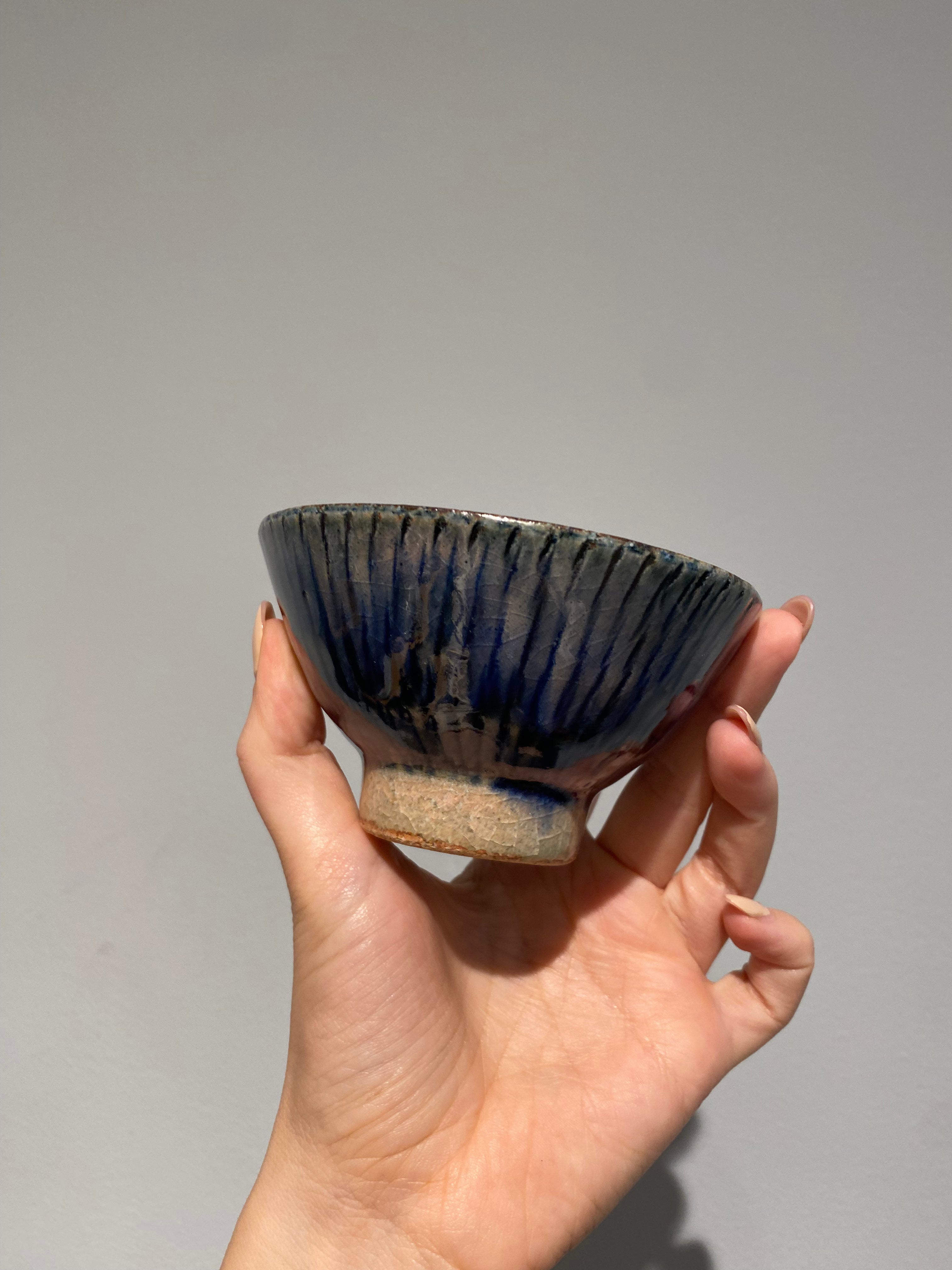 Small bowl with blue fluted glaze