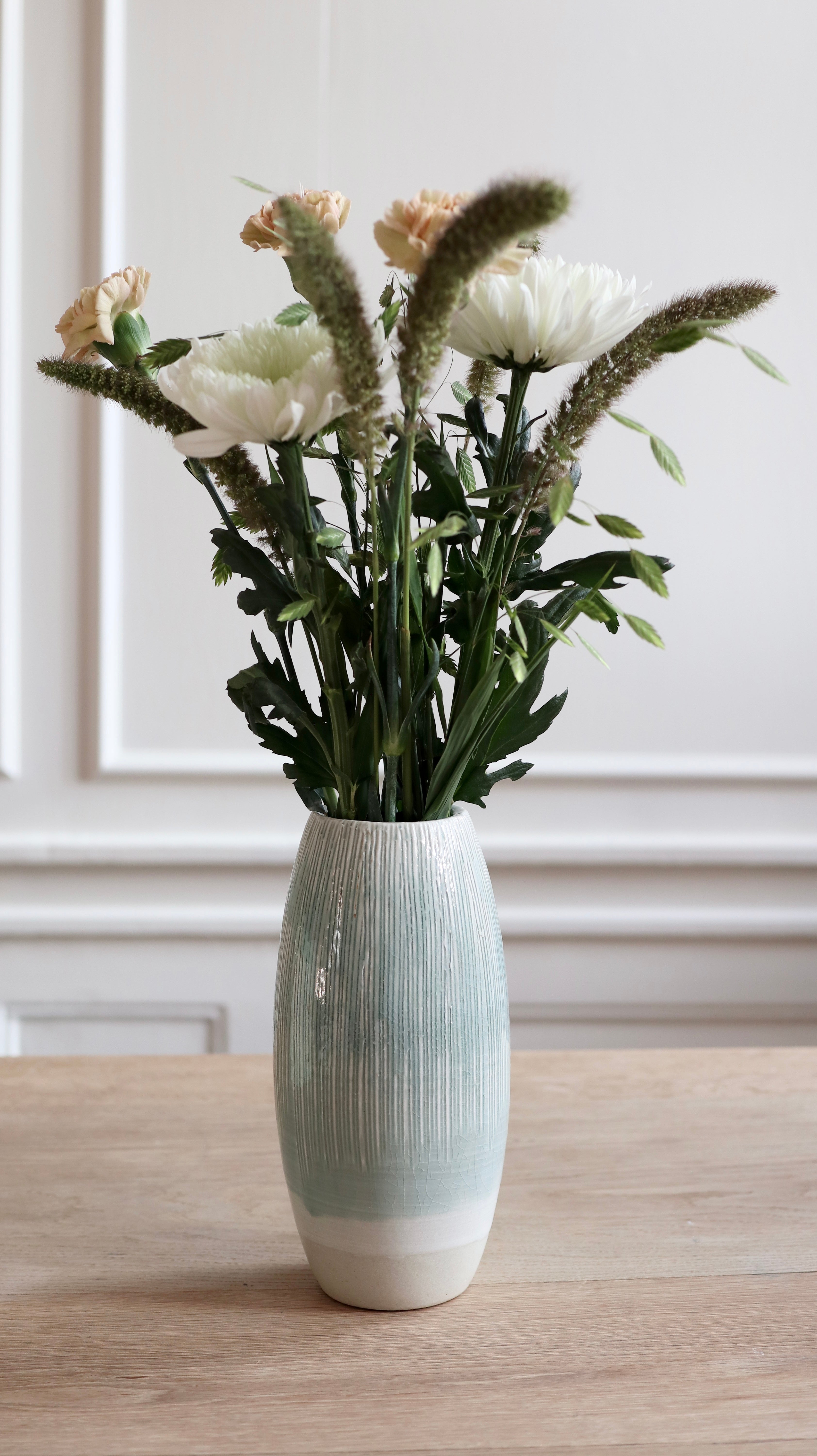 Large mint green vase with stripes