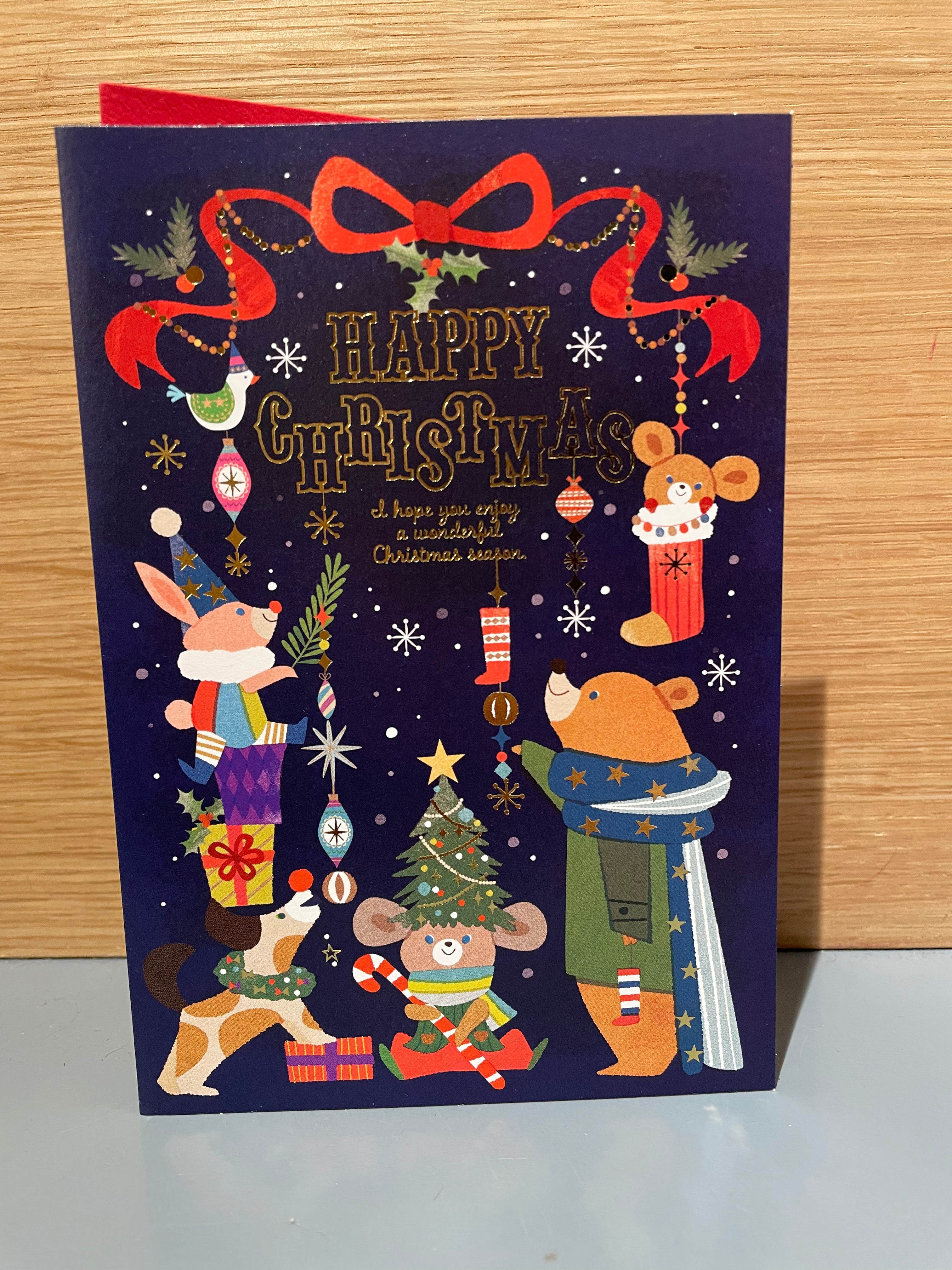 Christmas card with cute animals and gold details
