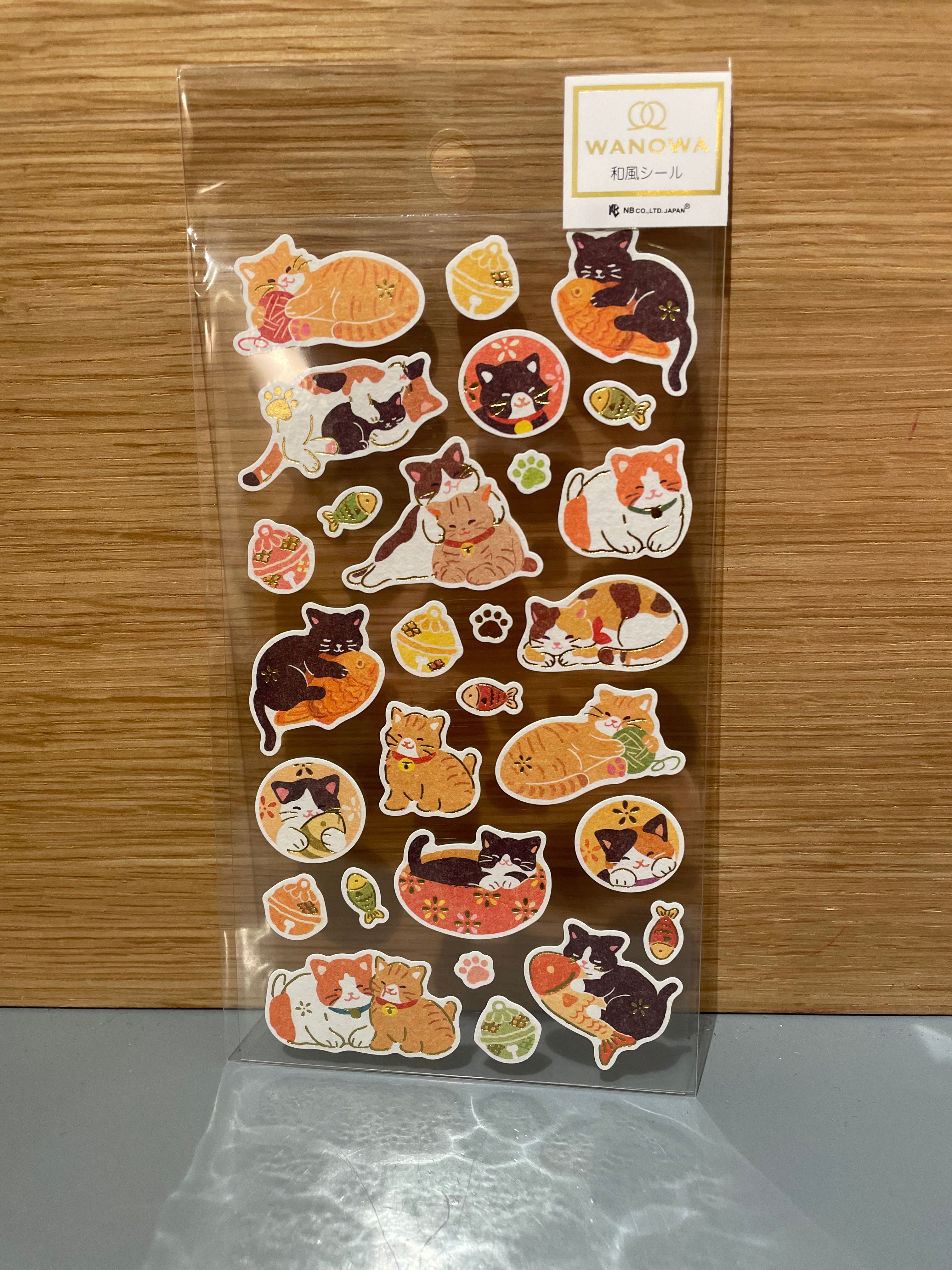 Stickers with cats and gold partial waists