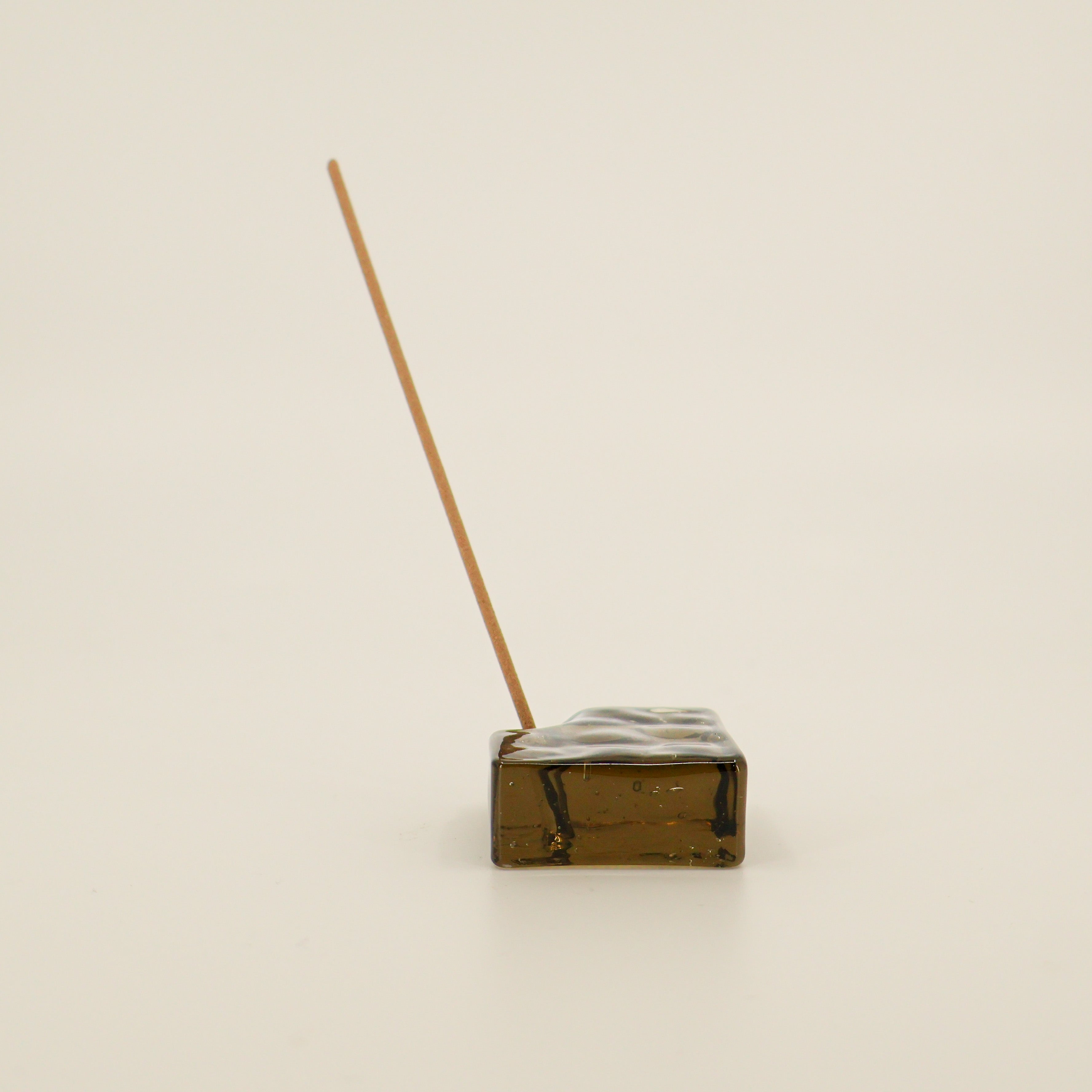 Brown glass incense holder