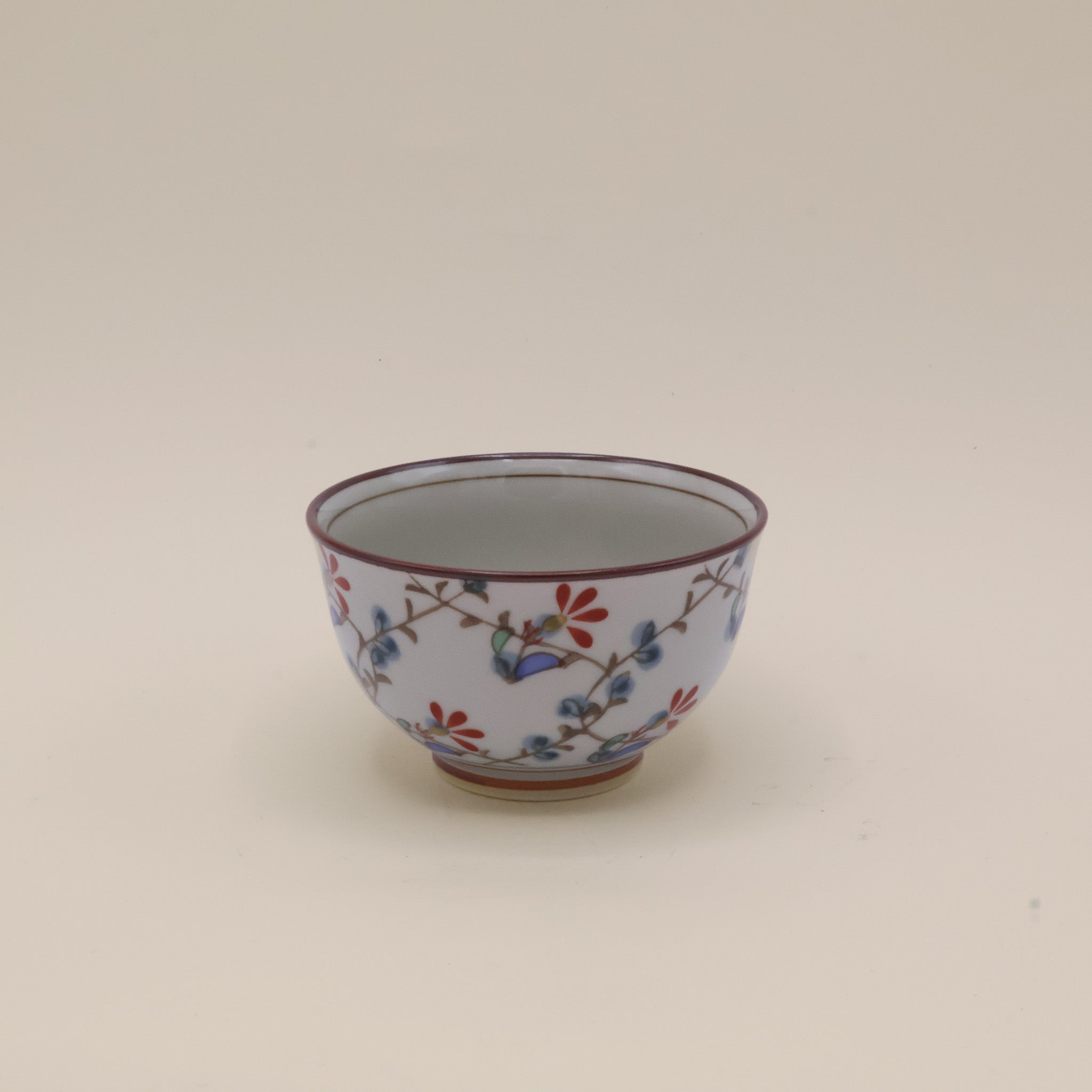 Skål/tekop med blå og røde blomster