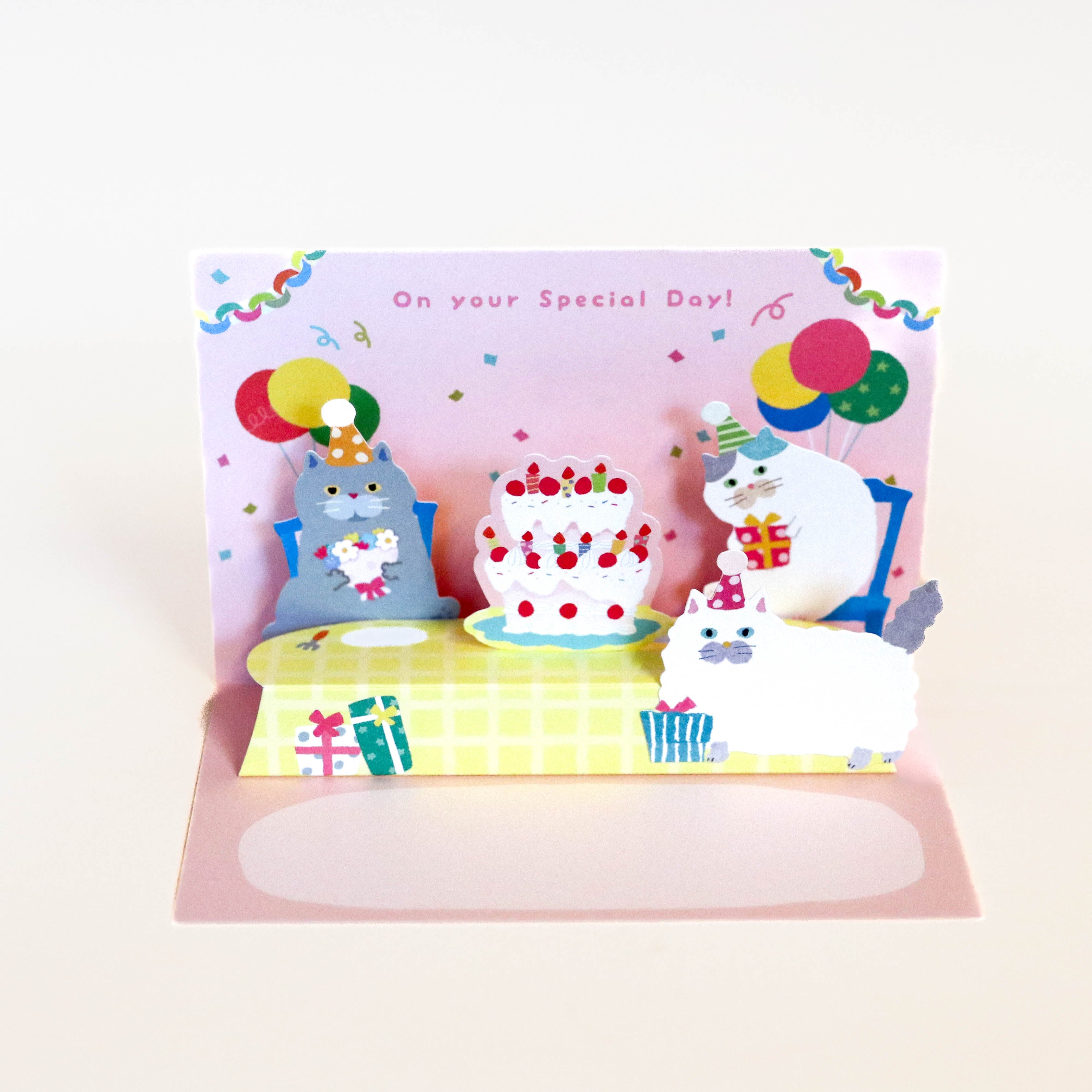 Pop-up birthday card with cats celebrating their birthday