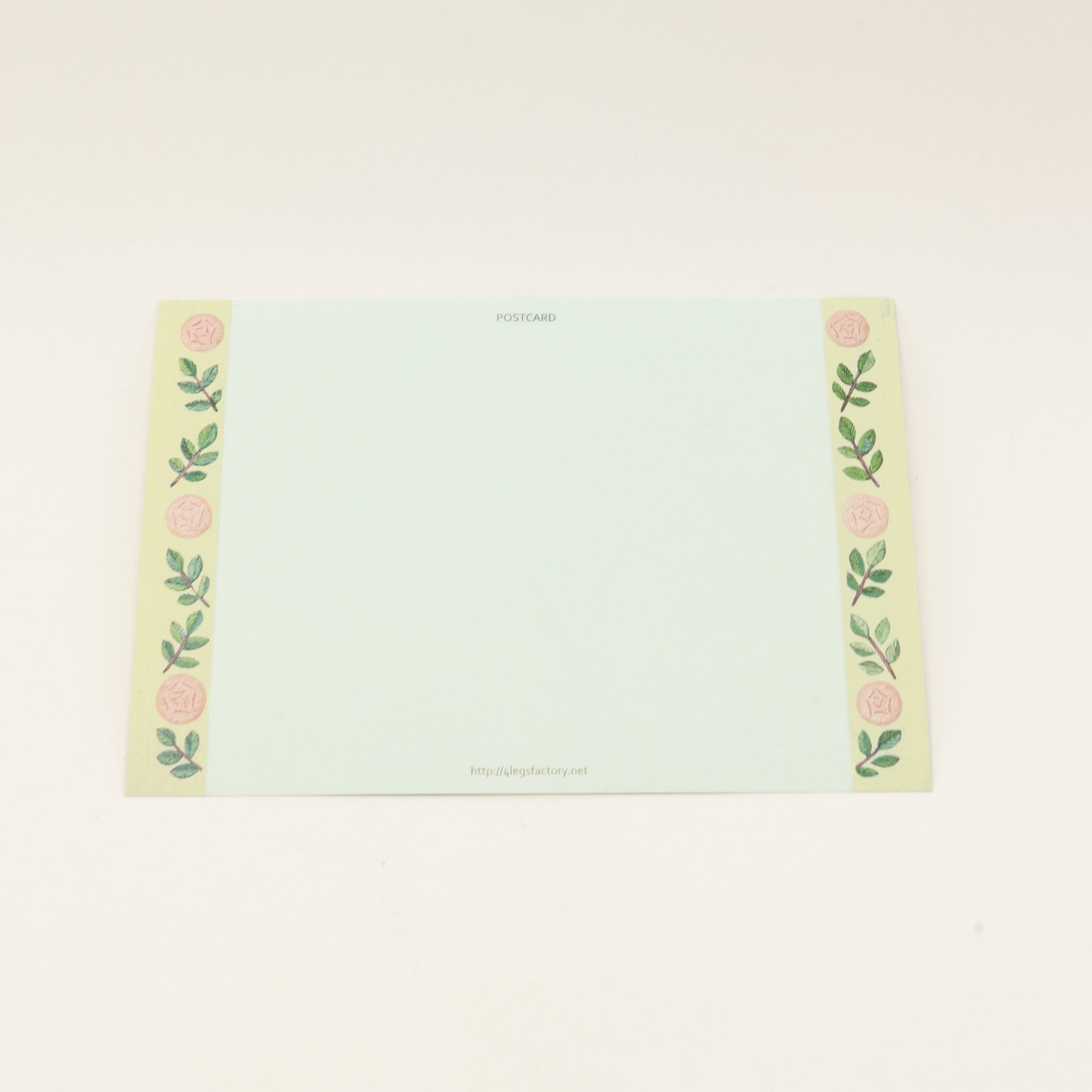 Japansk kort med kat der holder en rose