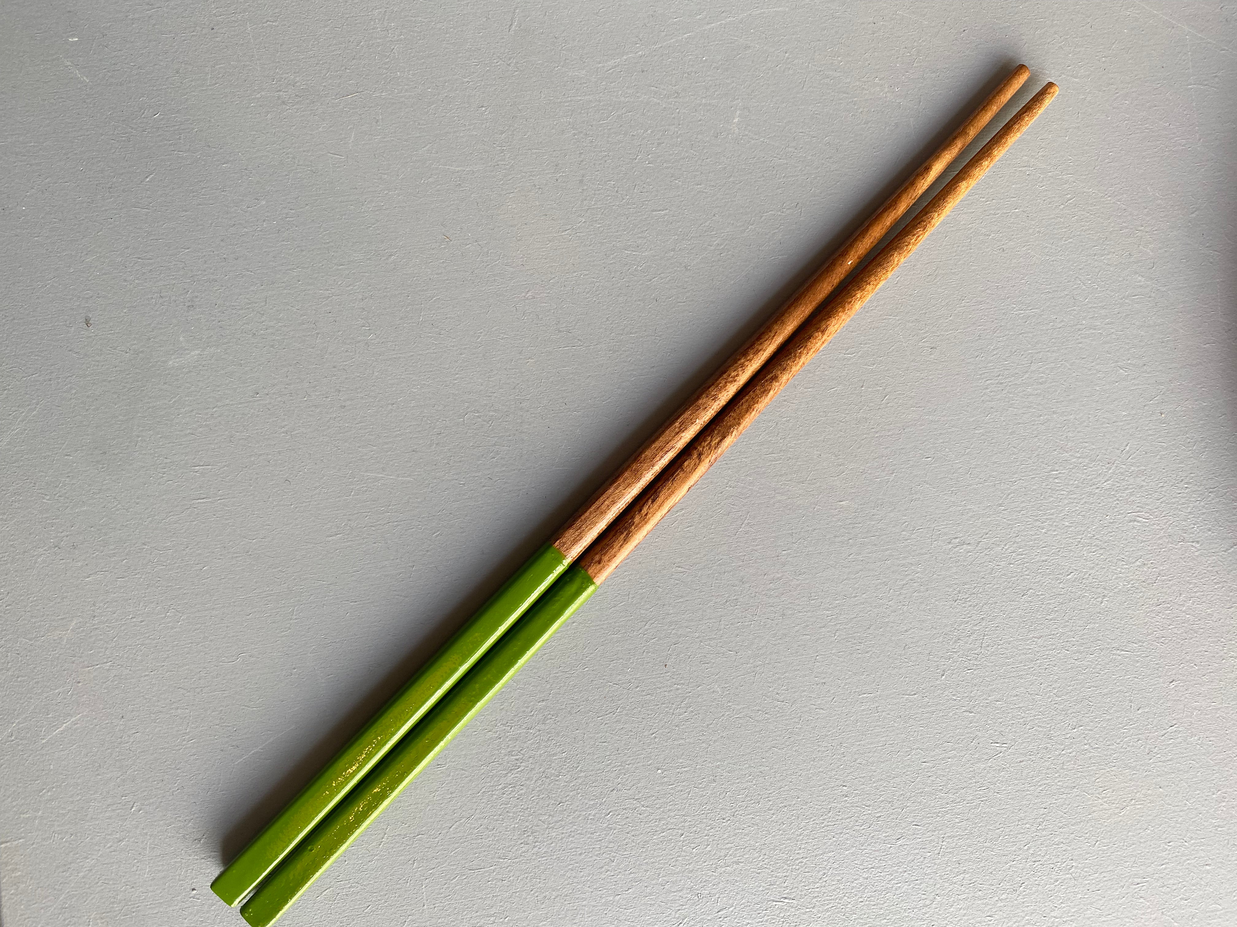 Chopsticks in dark wood