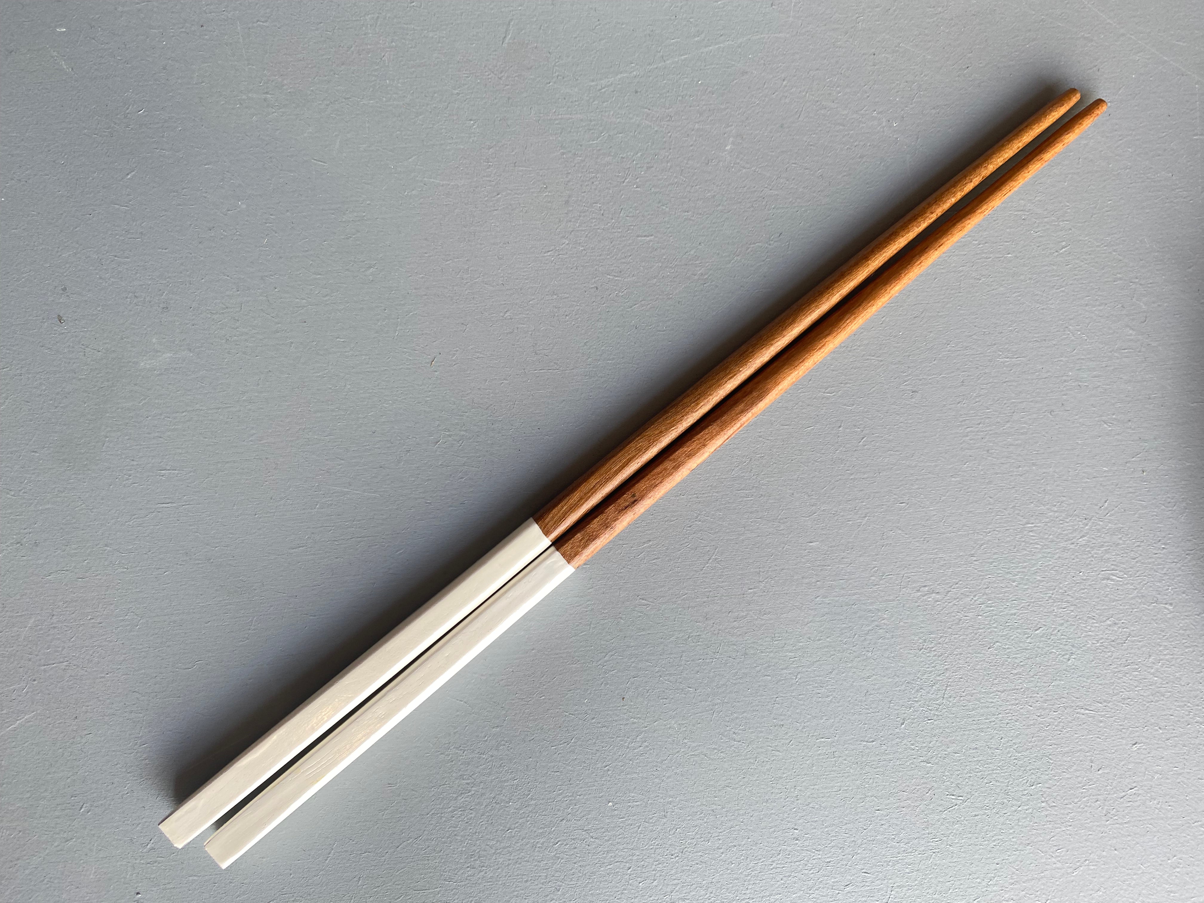 Chopsticks in dark wood