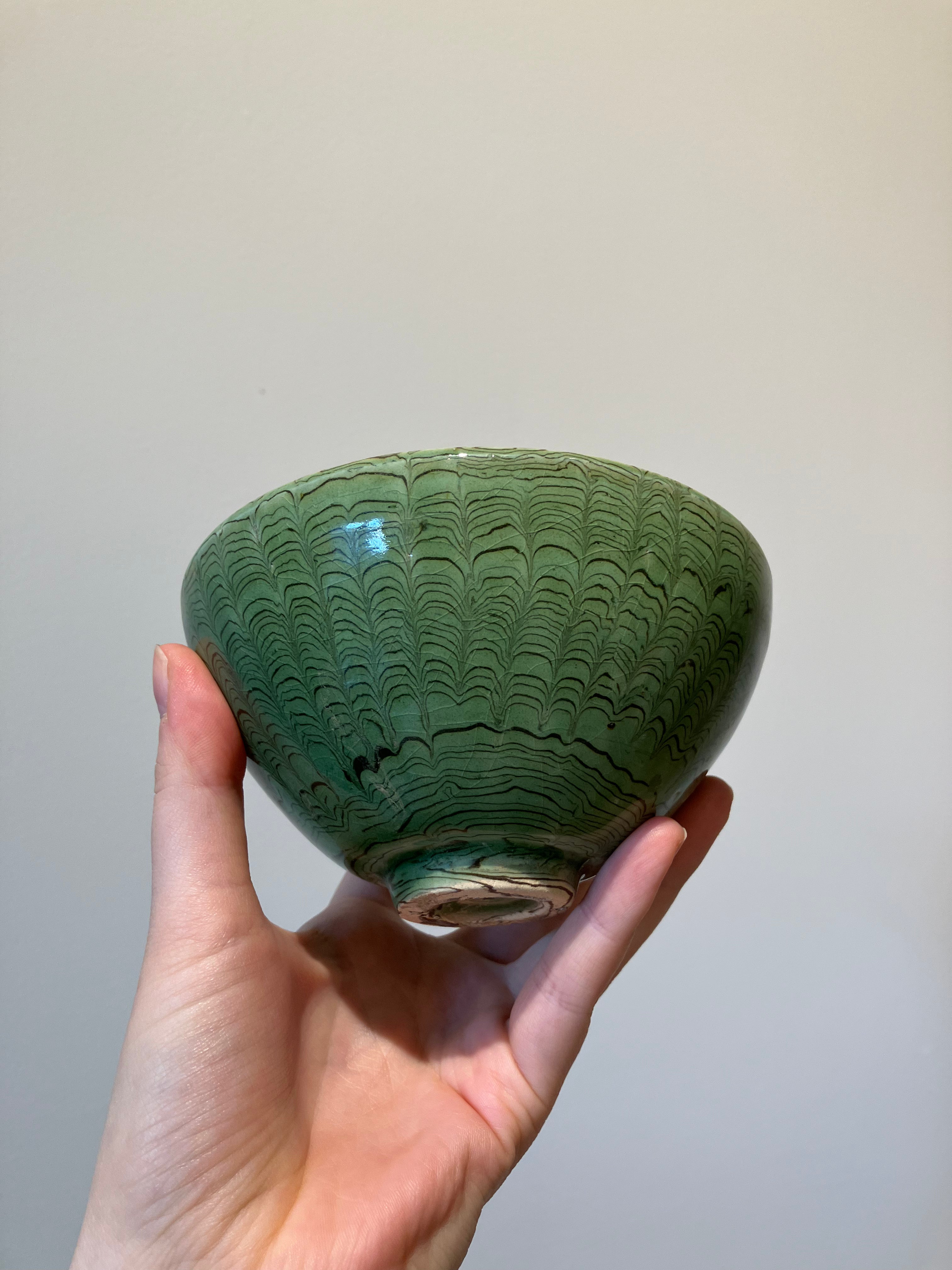 Handmade bowl in brown and green clay