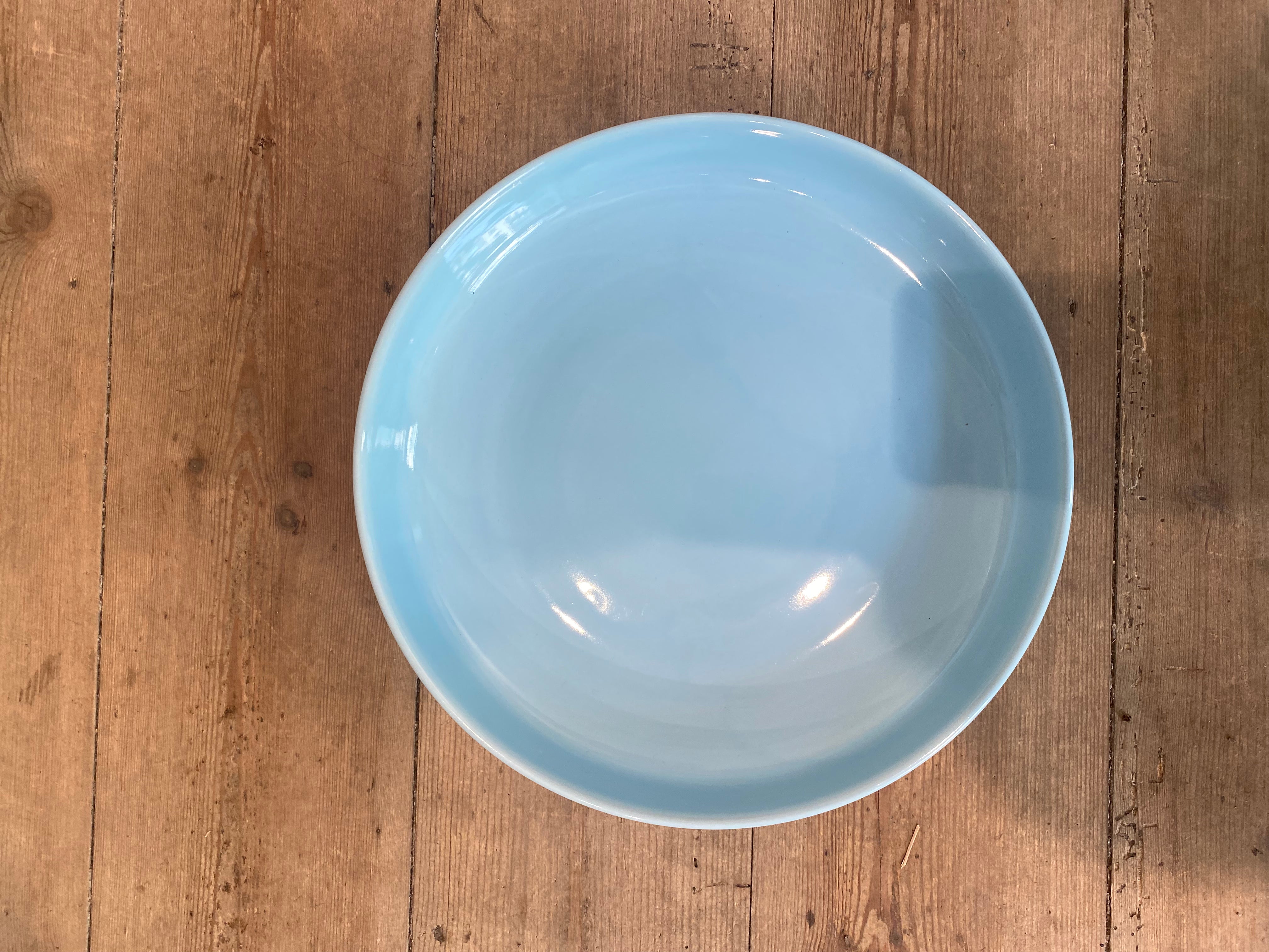 Large dish with light blue glaze