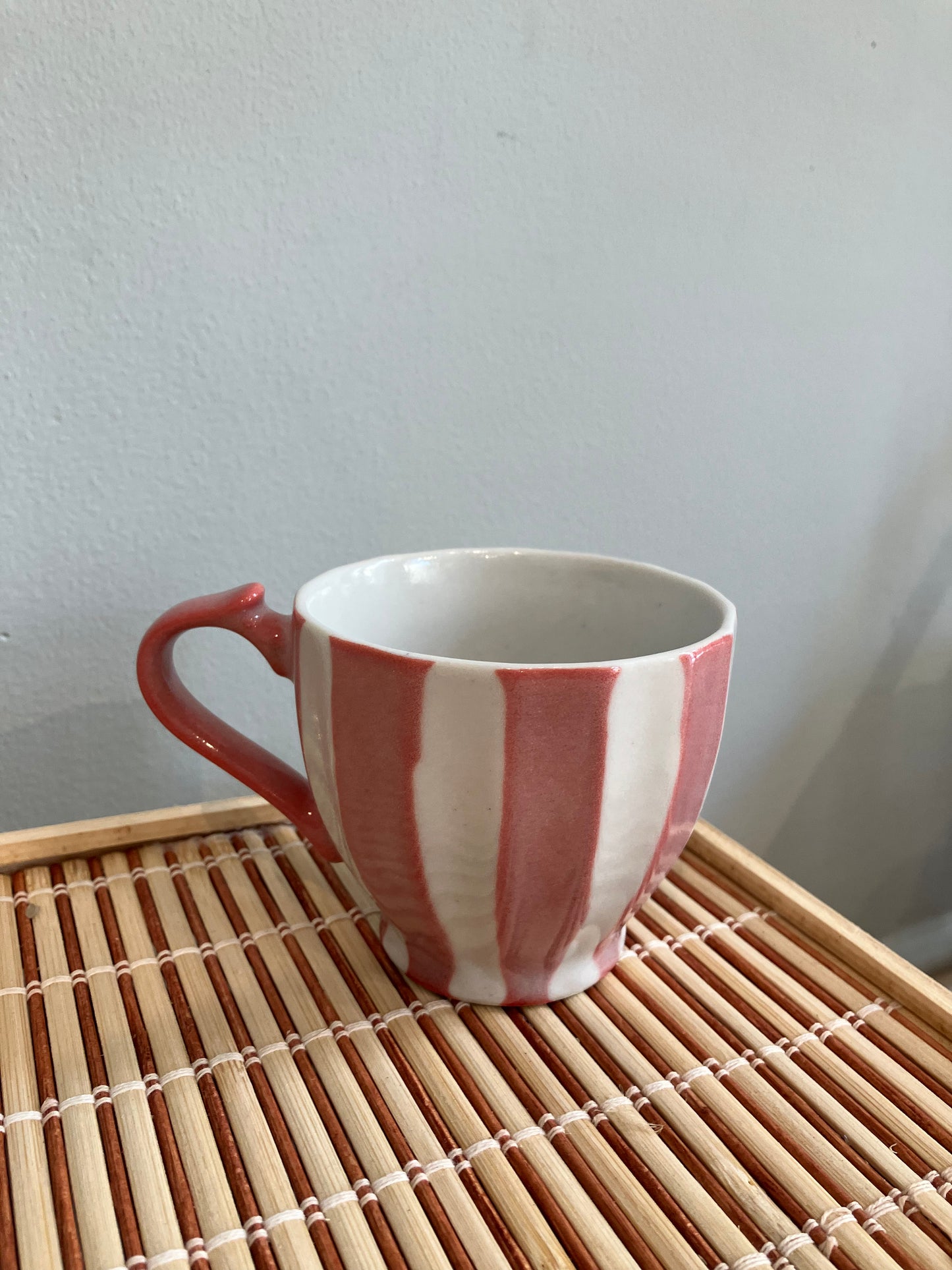 Japansk kop med lyserøde striber