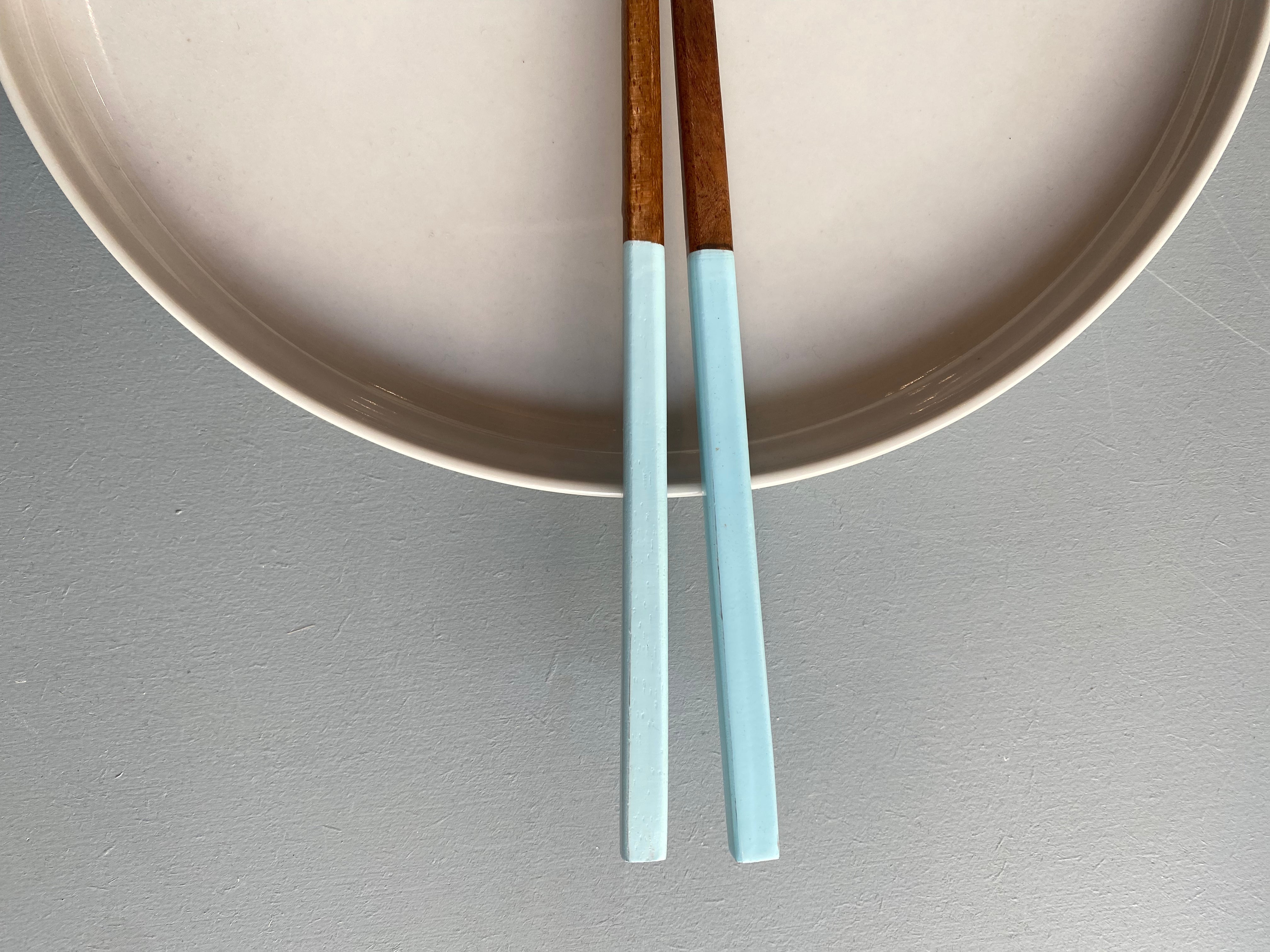 Chopsticks in dark wood