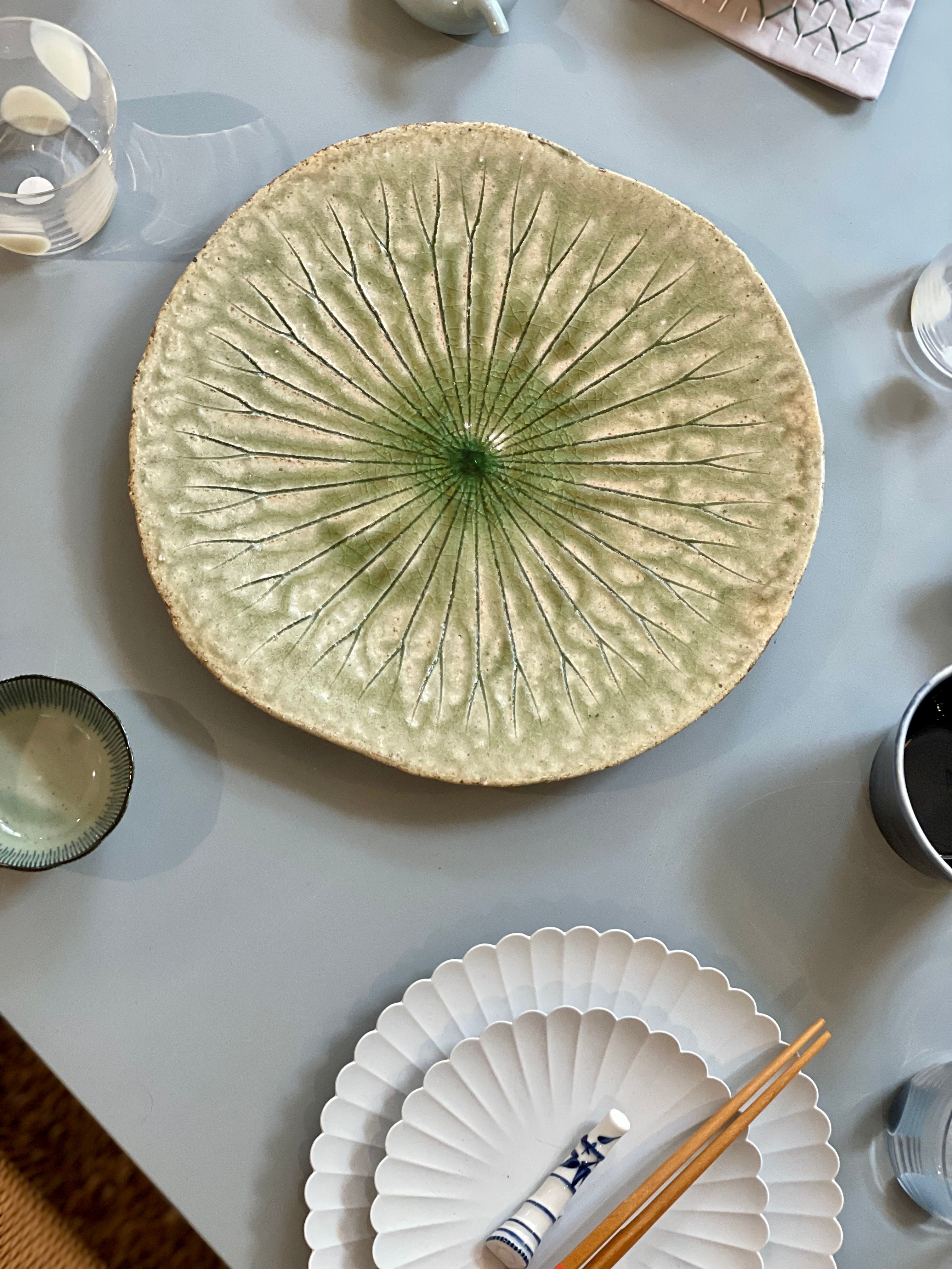 Large round dish with green leaf pattern