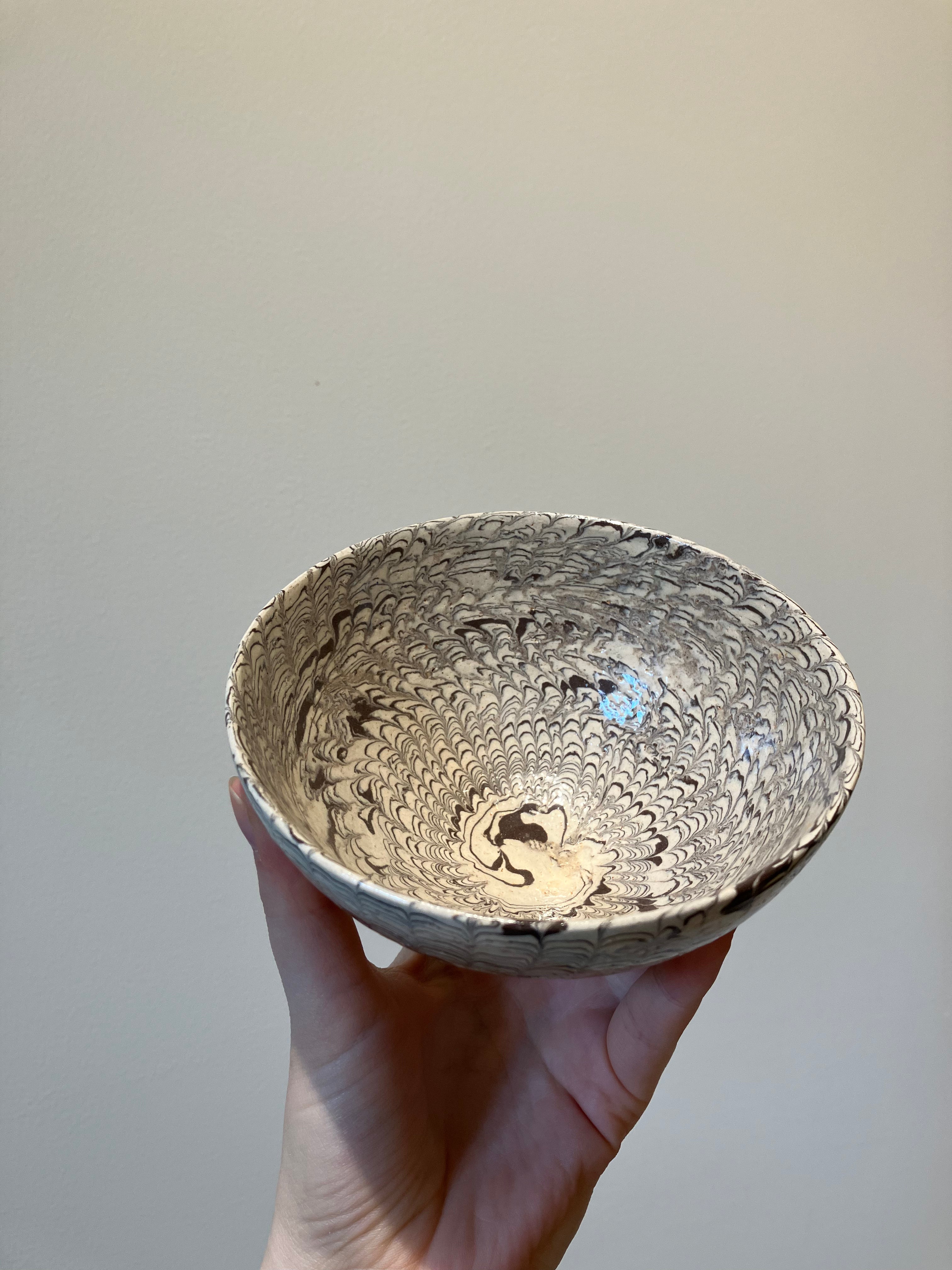 Handmade bowl in brown and beige clay