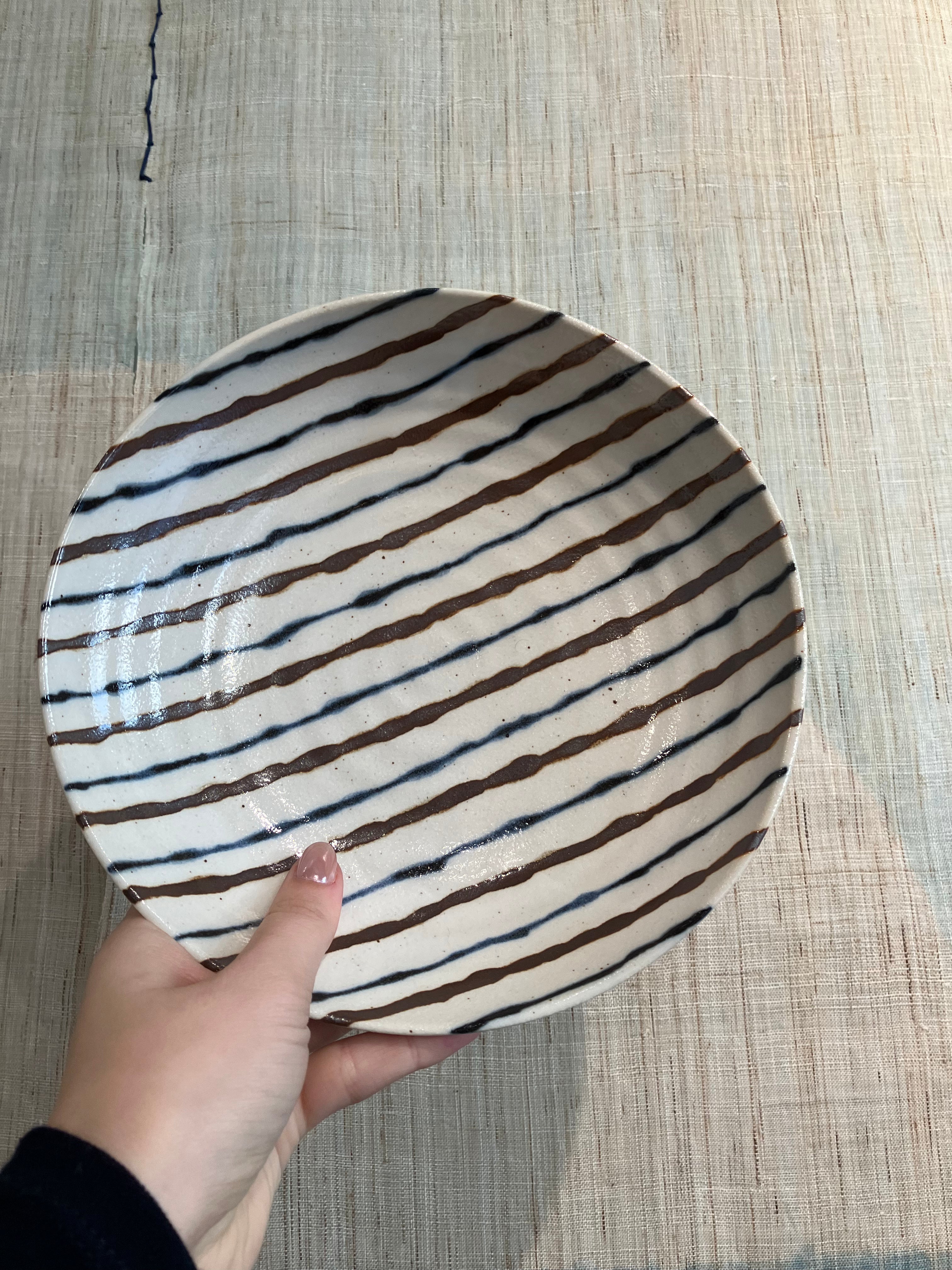 Bowl with blue and brown stripes