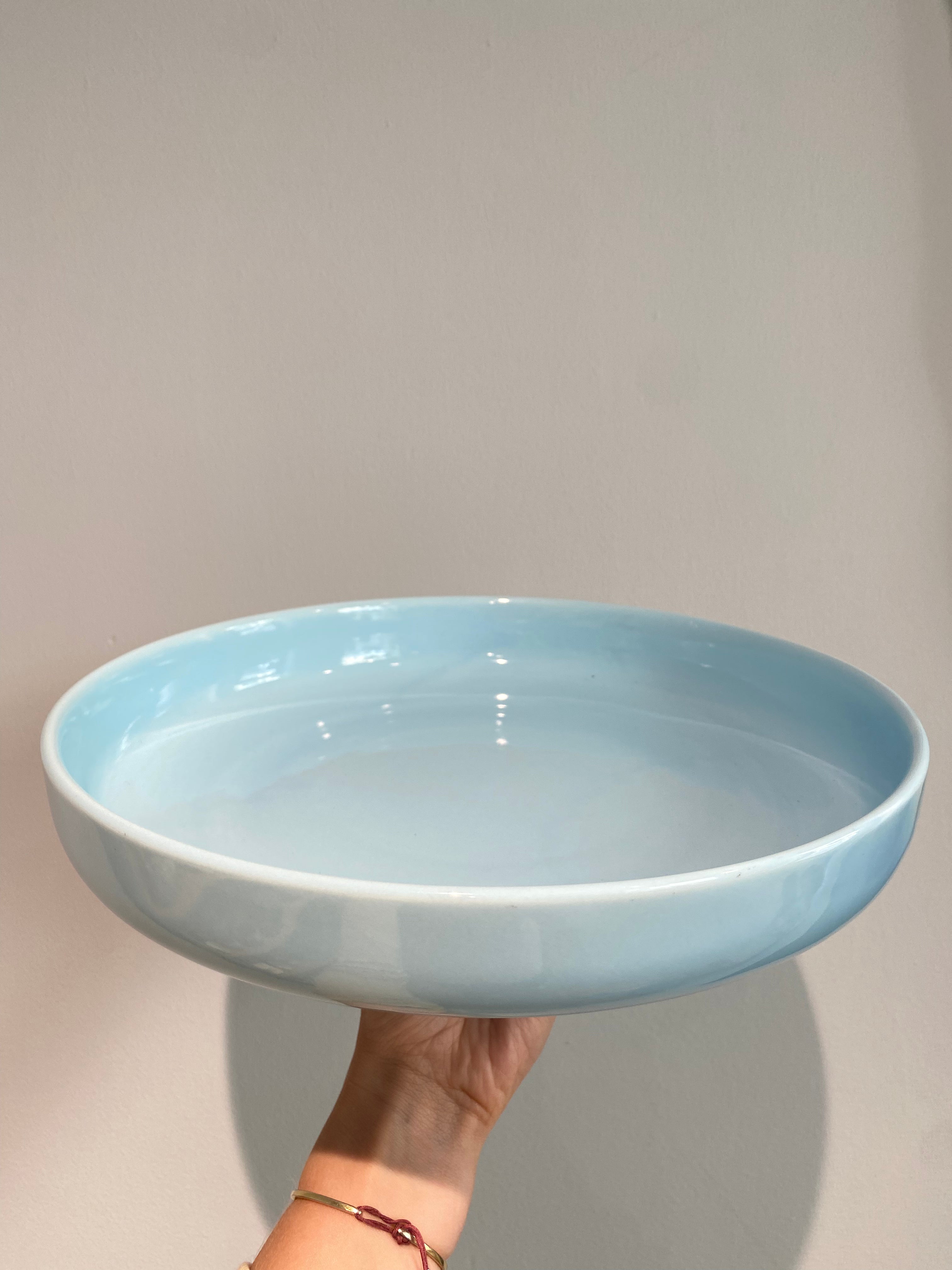 Large dish with light blue glaze