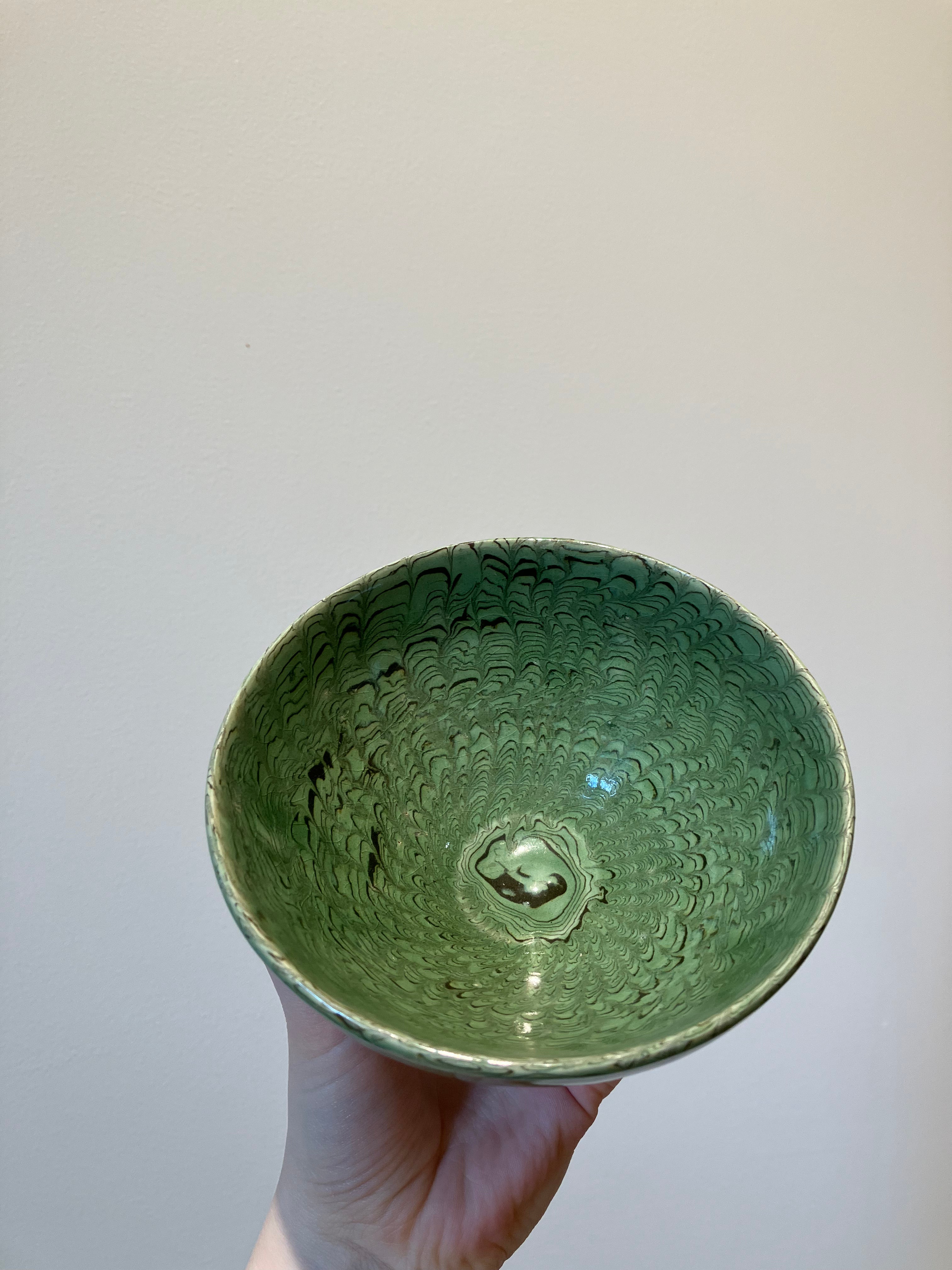 Handmade bowl in brown and green clay