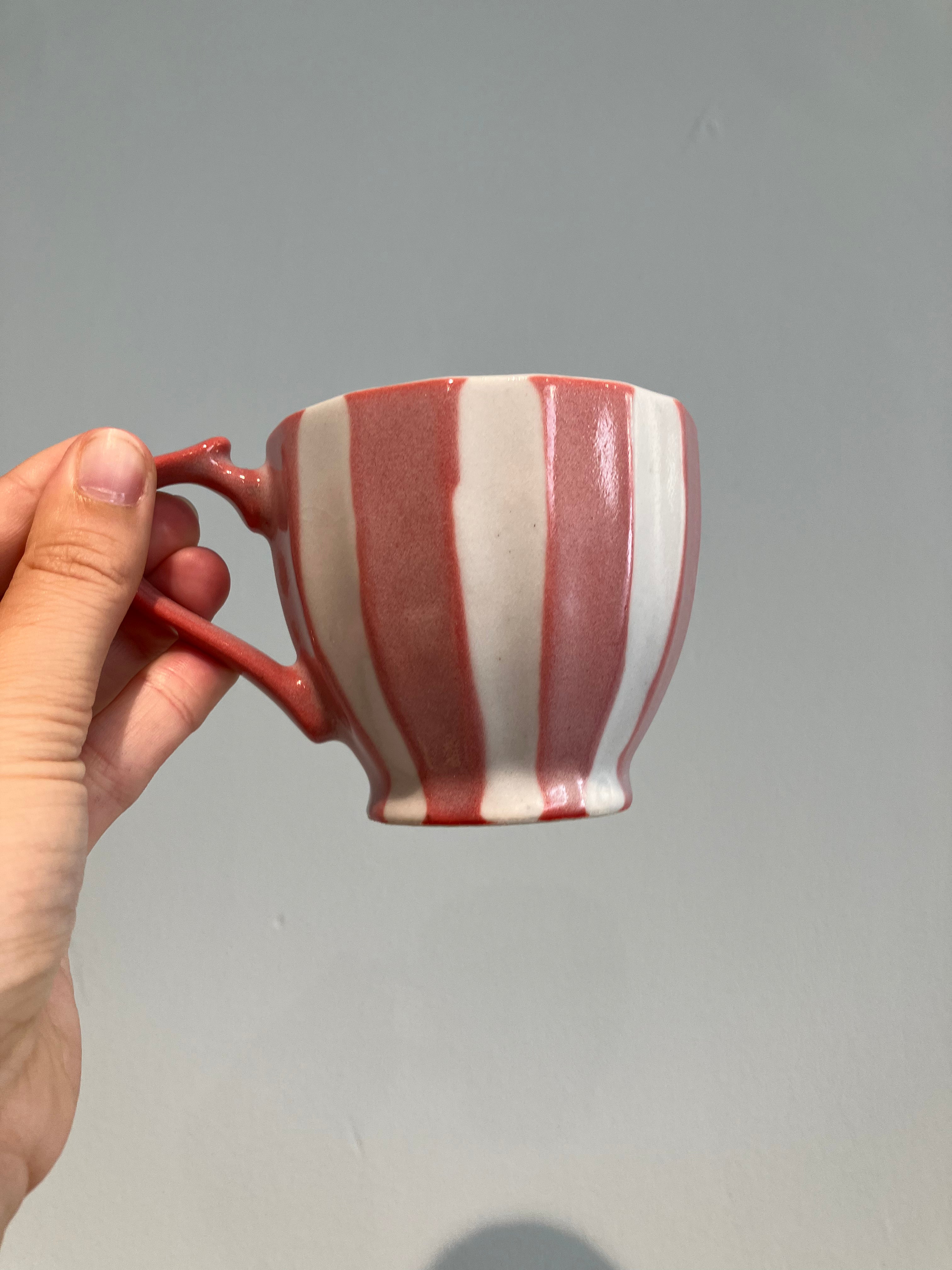 Japansk kop med lyserøde striber