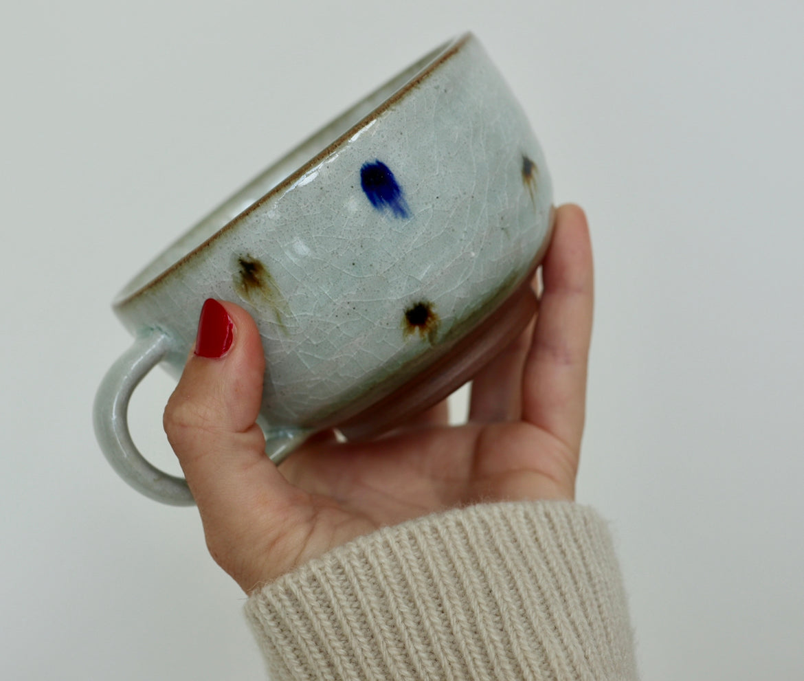 Cappuccino cup with dots