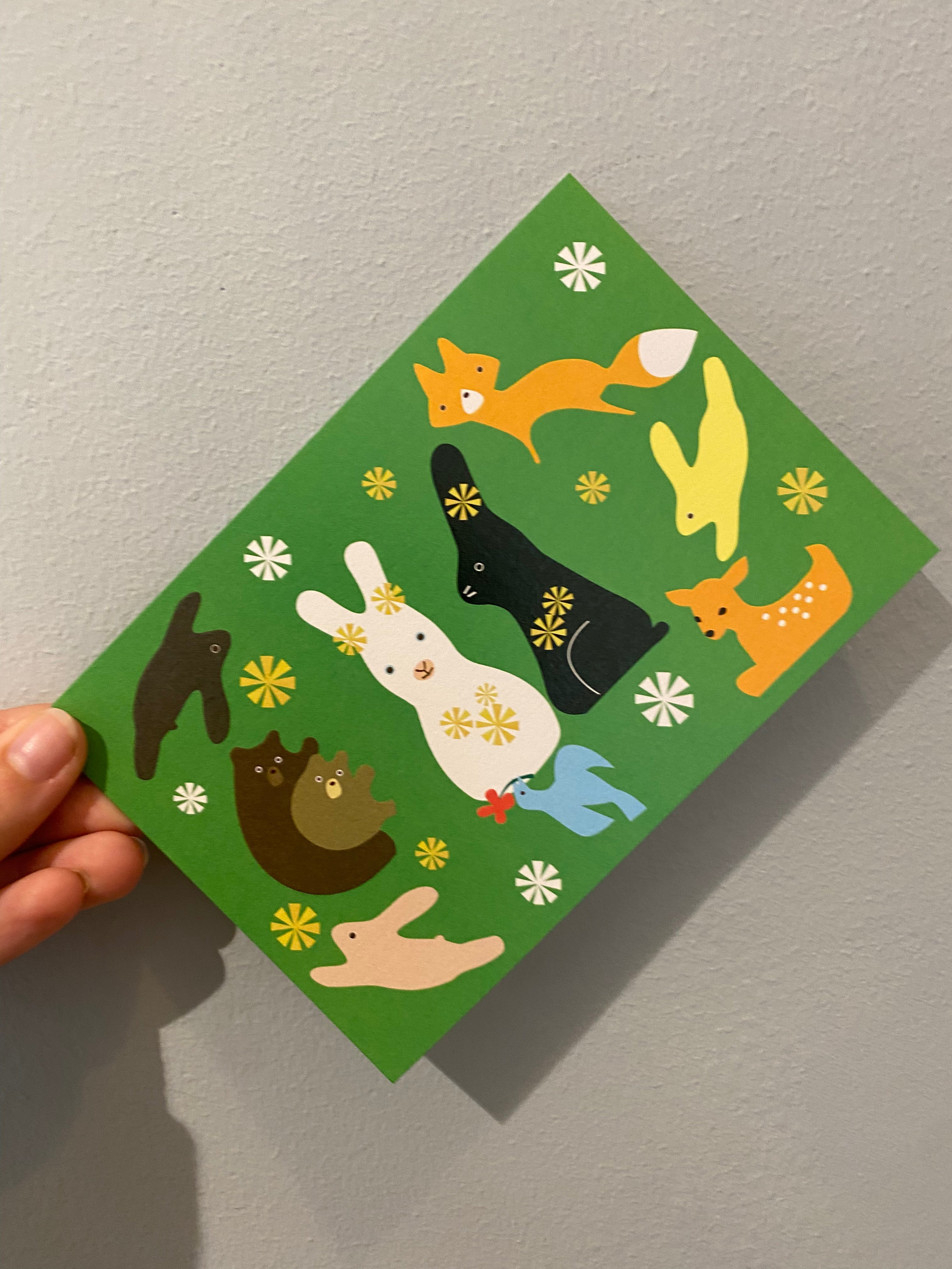 Green card with different animals