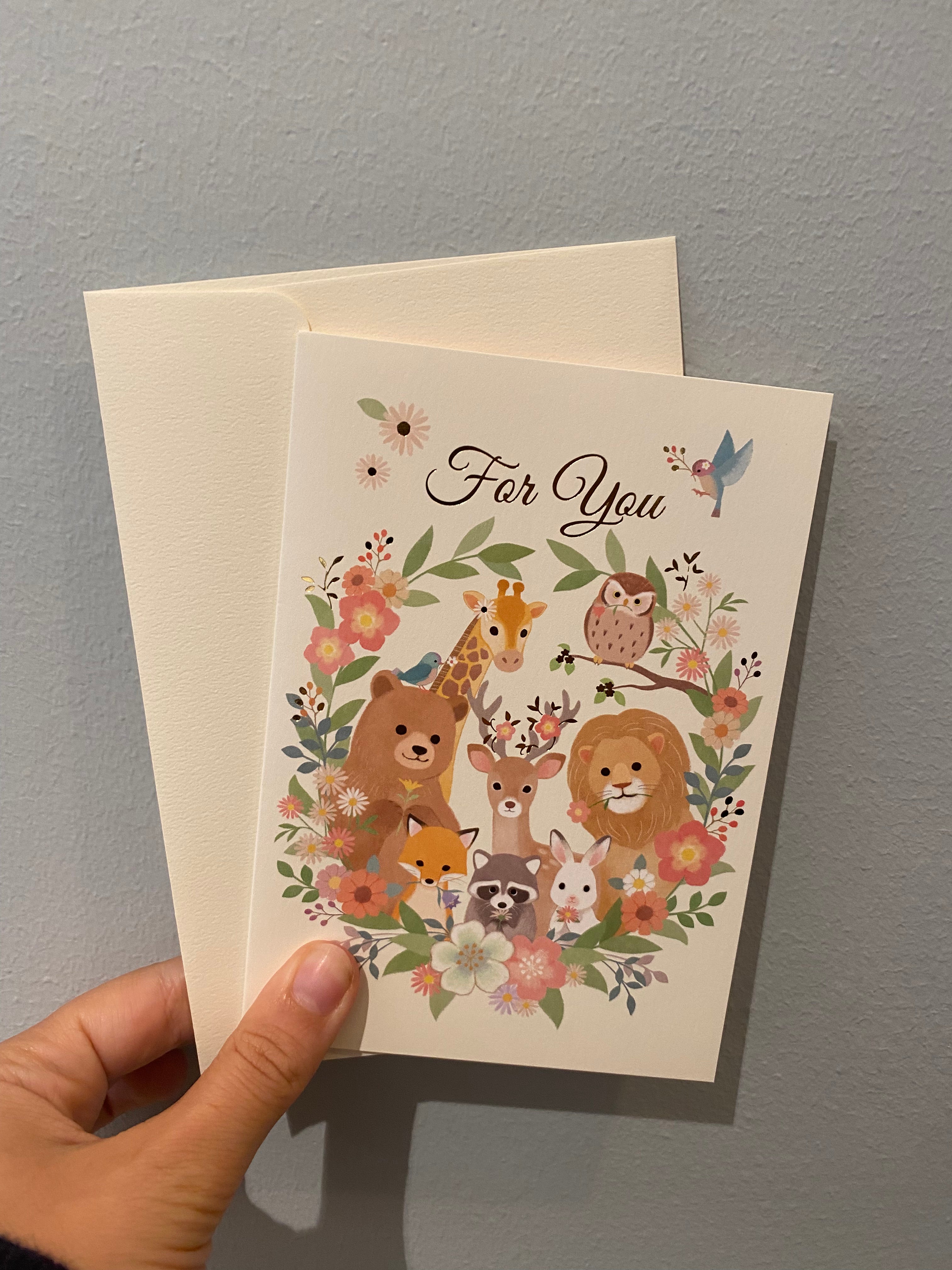 Card with forest animals and "for you" written in gold