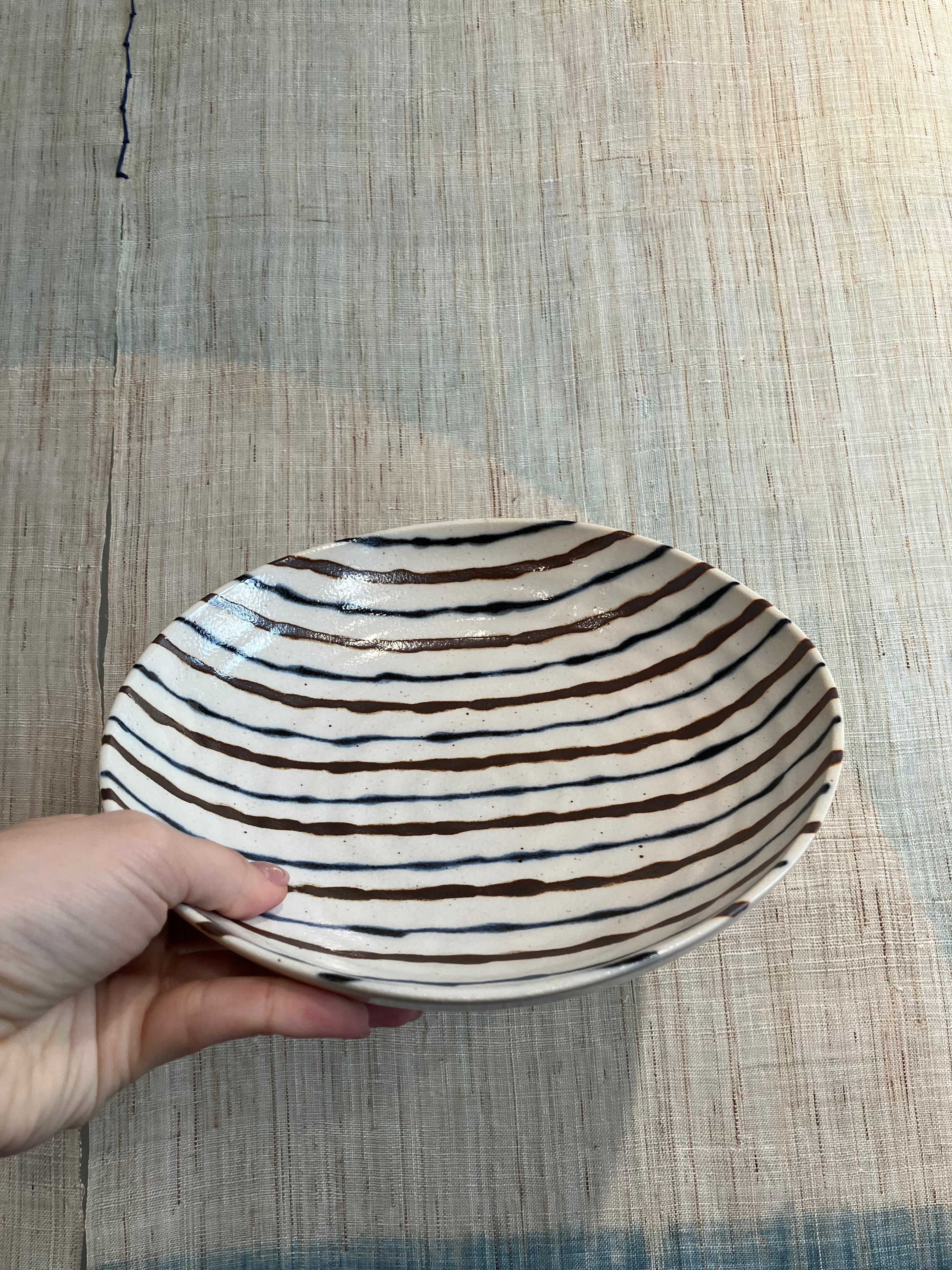 Bowl with blue and brown stripes