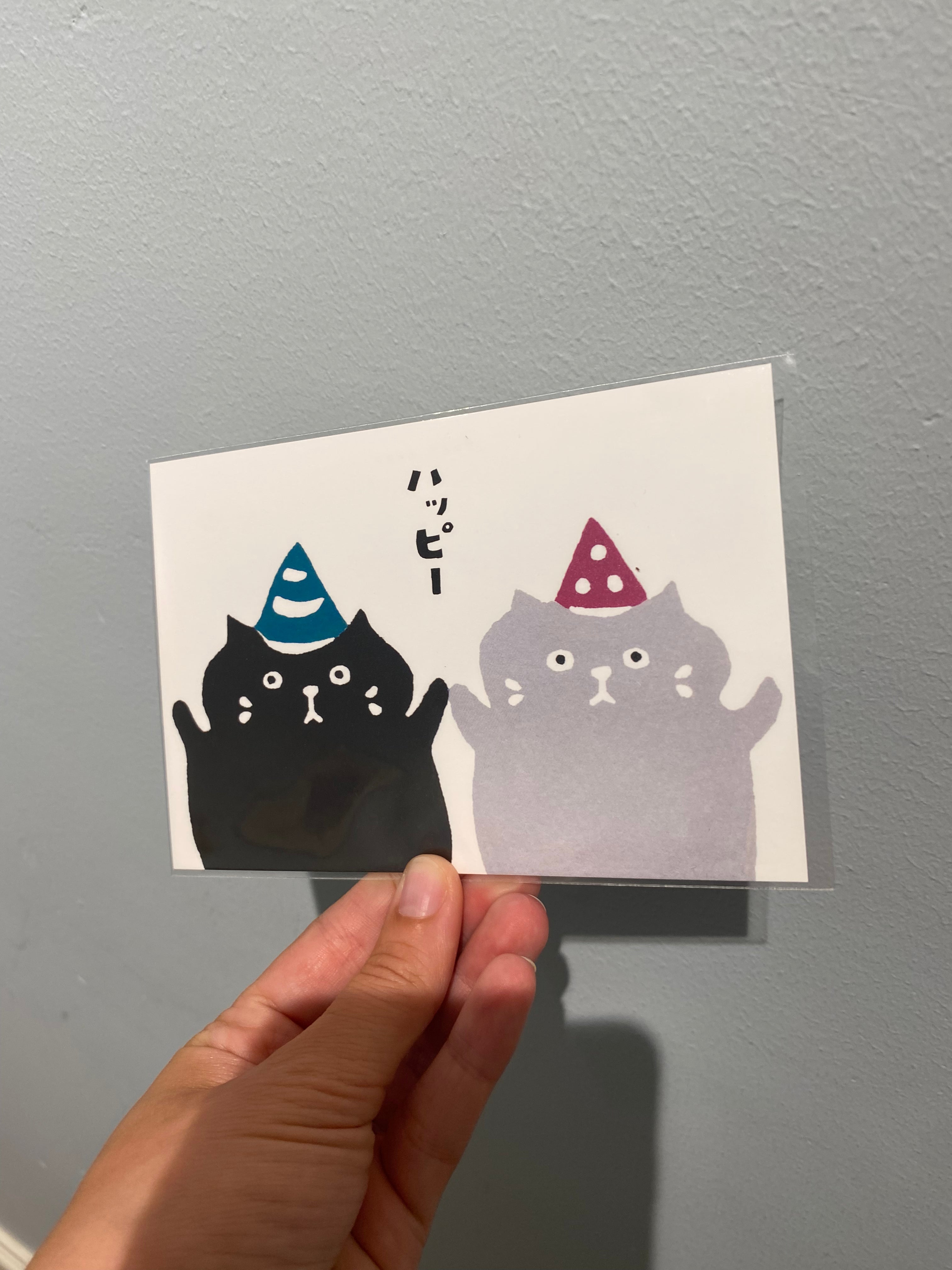Birthday card with cats and party hats