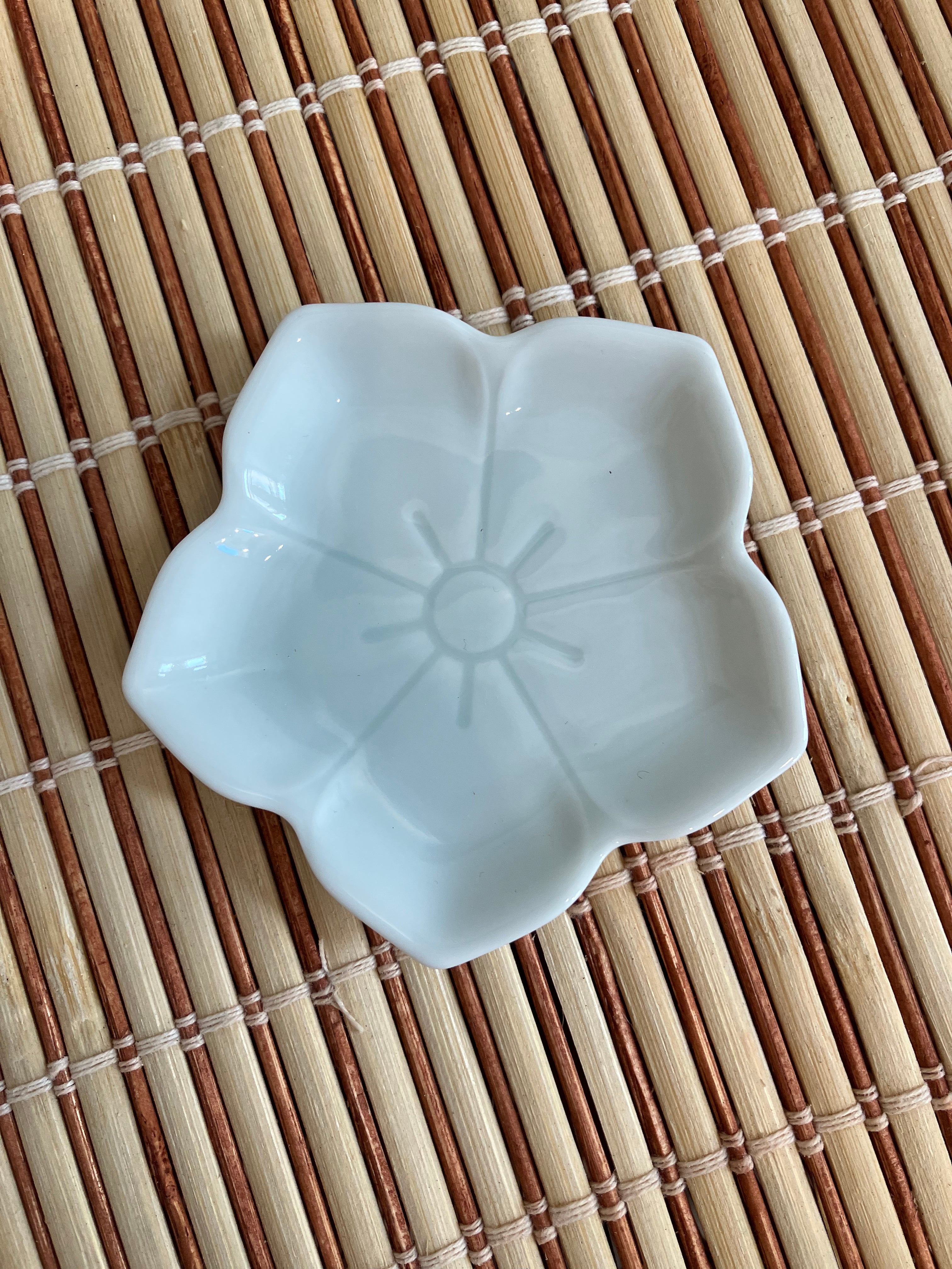 Flower bowl with light blue glaze