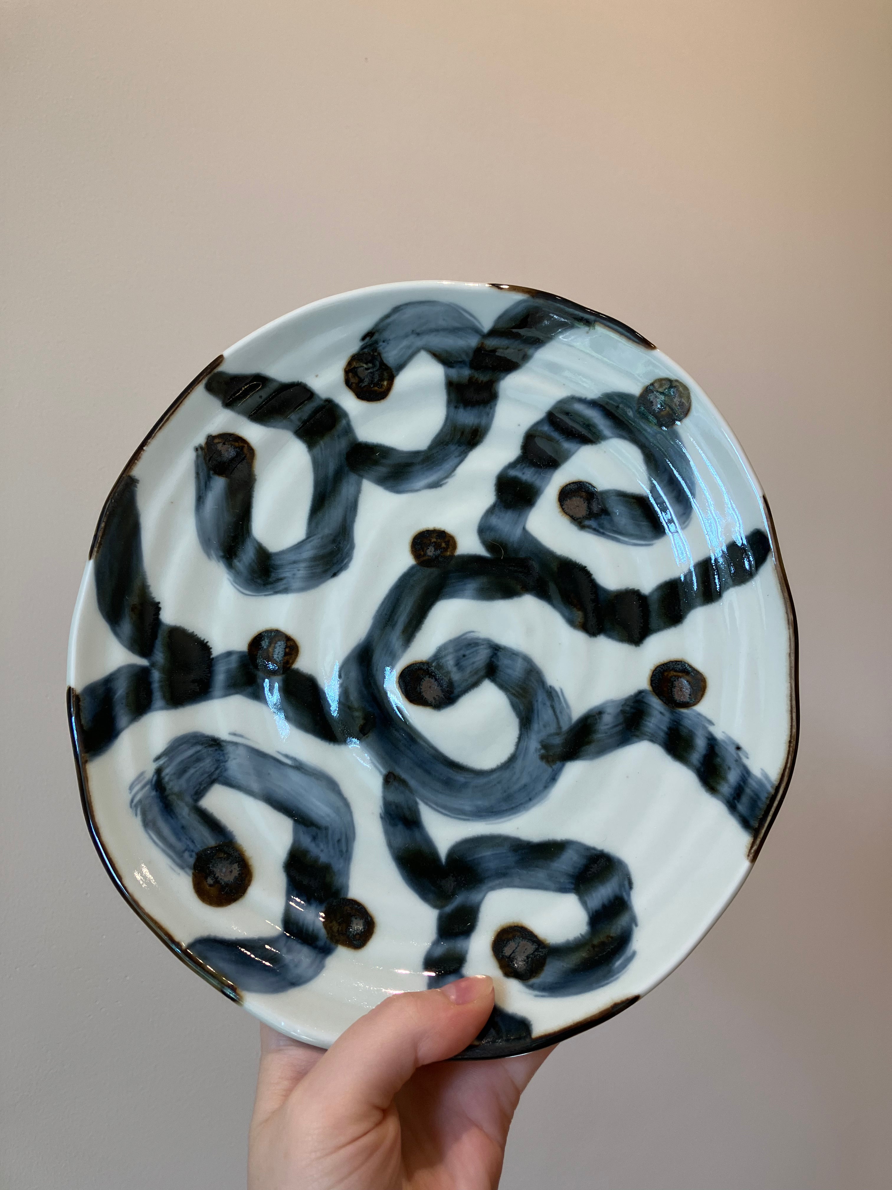 Dish with wavy texture and blue pattern