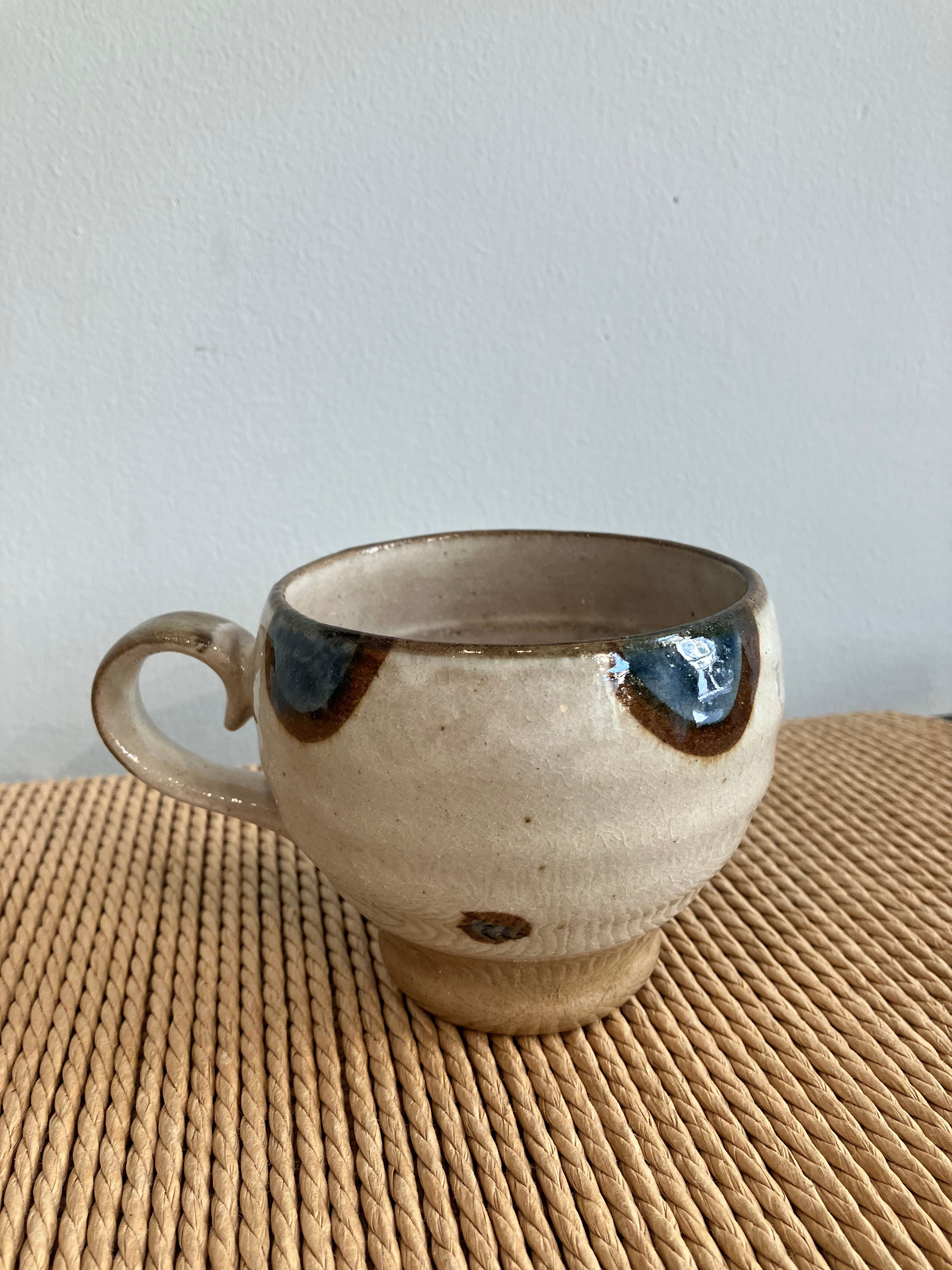 Japanese cup with blue/brown circles and dots